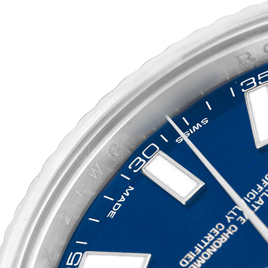 The image shows a close-up of the dial and bezel edge of a Rolex Datejust 116334 Men's Stainless Steel Blue Dial watch, highlighting the hour markers and part of the second hand.