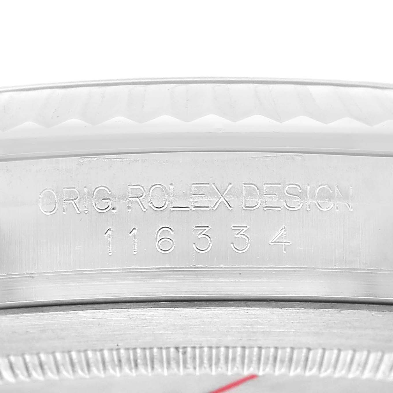 This image shows the side of the Rolex Datejust 116334 Men's Stainless Steel Blue Dial case with engraved model and design details.