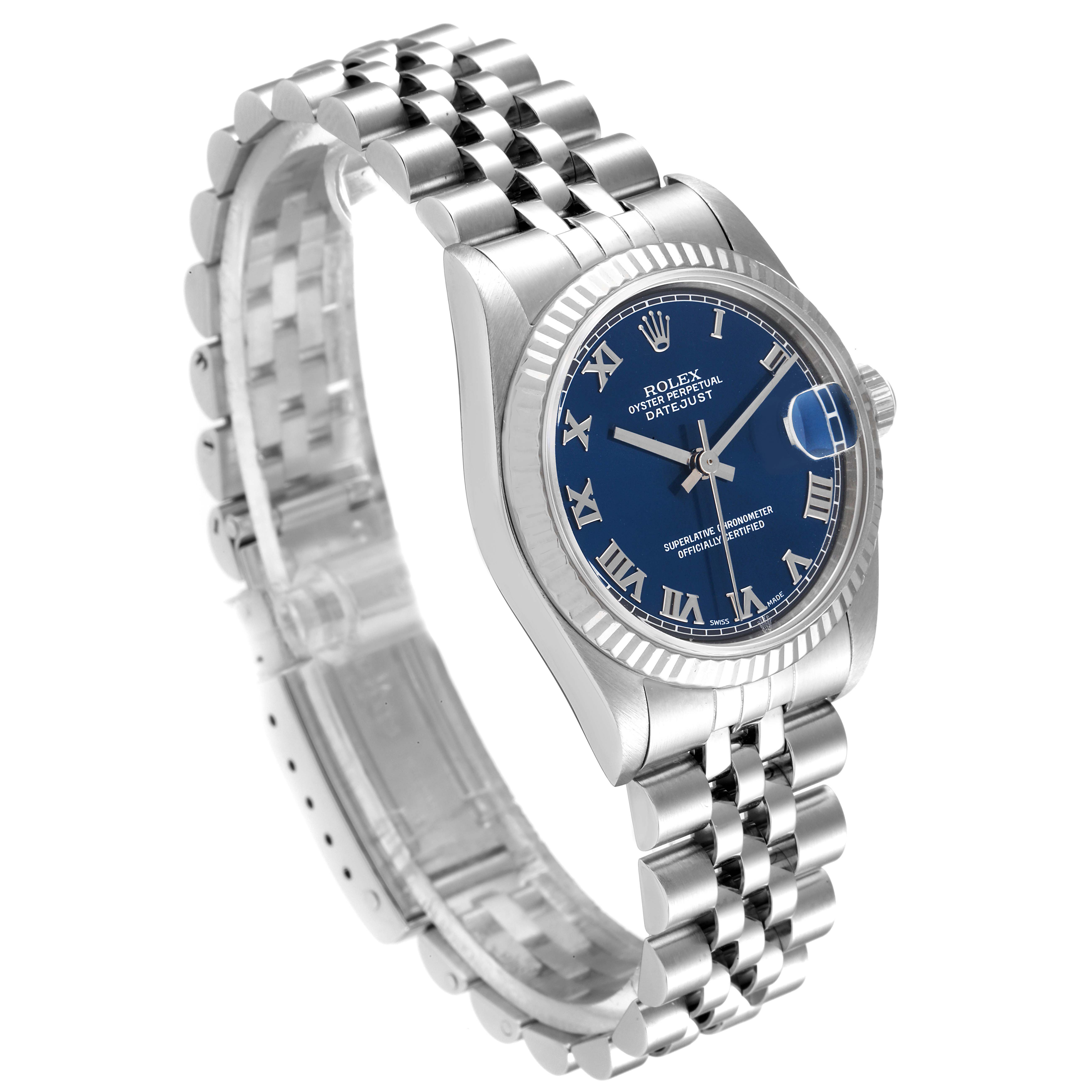 This image shows the Rolex Mid-Size 68274 Women
s Stainless Steel Blue Dial 68274 Women
s Stainless Steel Blue Dial Datejust watch at an angle highlighting its blue dial, Roman numerals, and Jubilee bracelet.