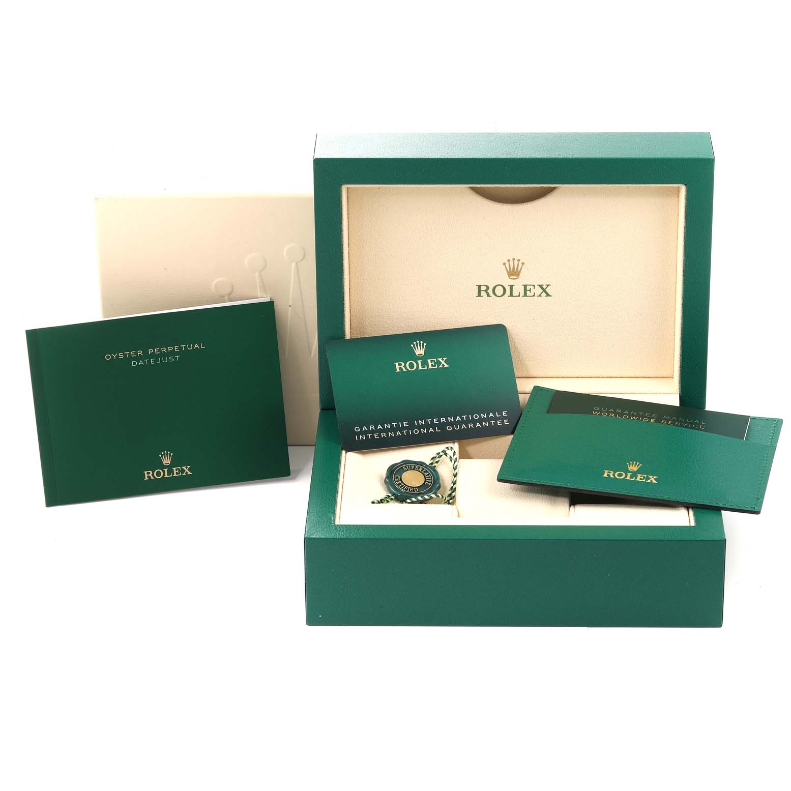 The image shows the packaging, instruction manuals, and guarantee cards for a Mid-Size Rolex Oyster Perpetual Datejust watch.