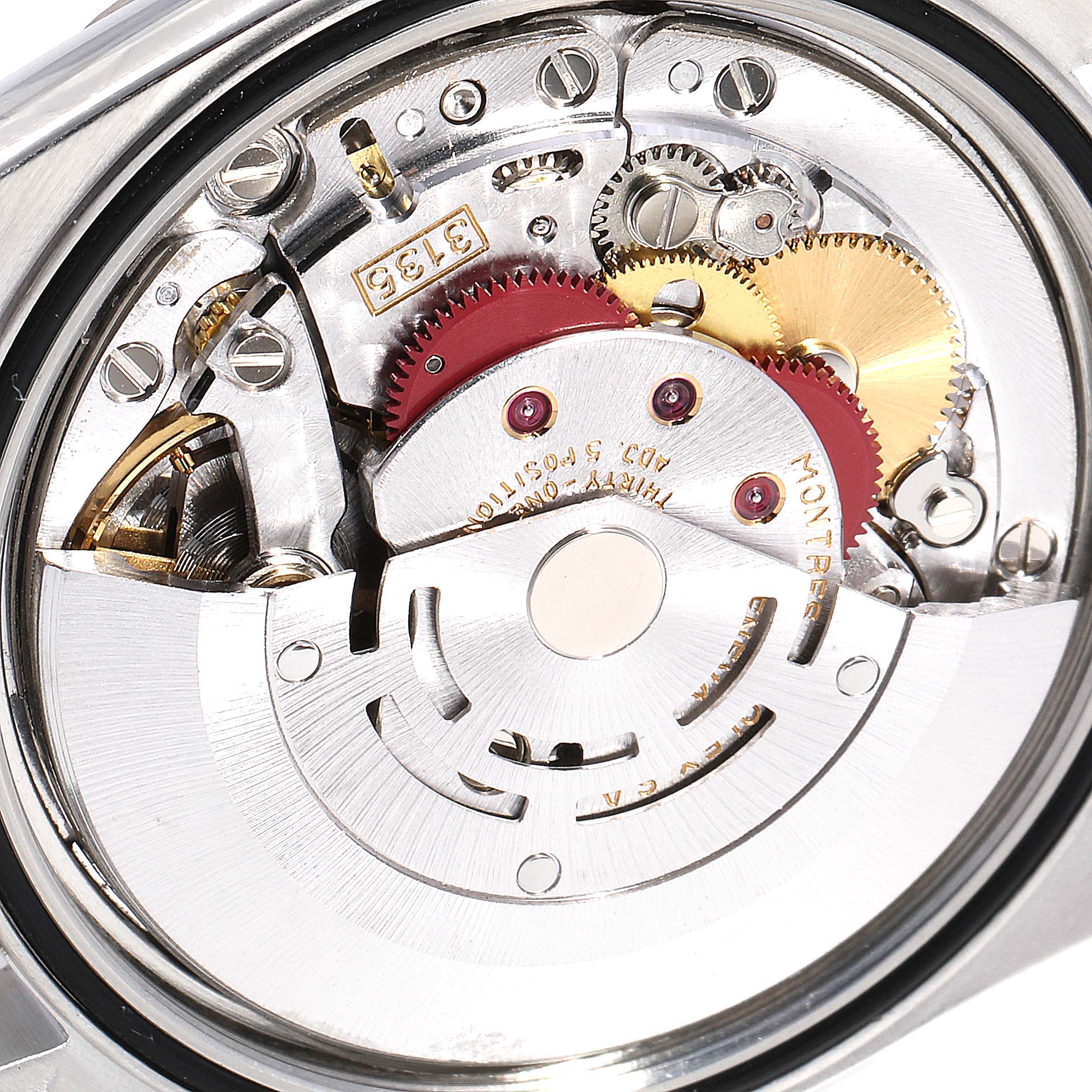 This image shows the intricate internal mechanism of a Rolex Datejust 16234 Men's Stainless Steel Silver Dial 16234 Men's Stainless Steel Silver Dial watch from a macro angle.