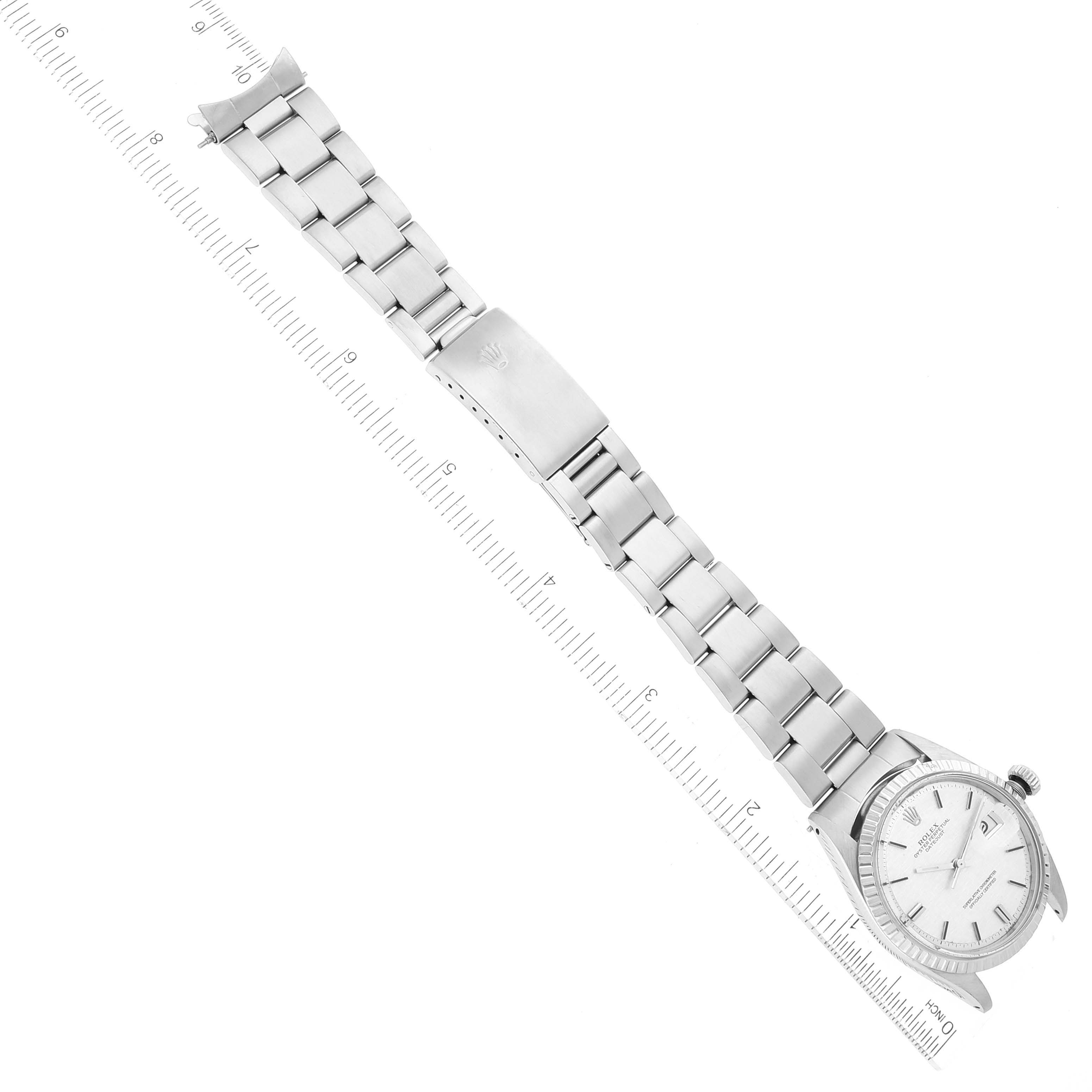 The image shows a Rolex Vintage Collection 1603 Men's Stainless Steel Silver Dial 1603 Men's Stainless Steel Silver Dial model watch from a top-down angle with a visible bracelet, clasp, and the face.