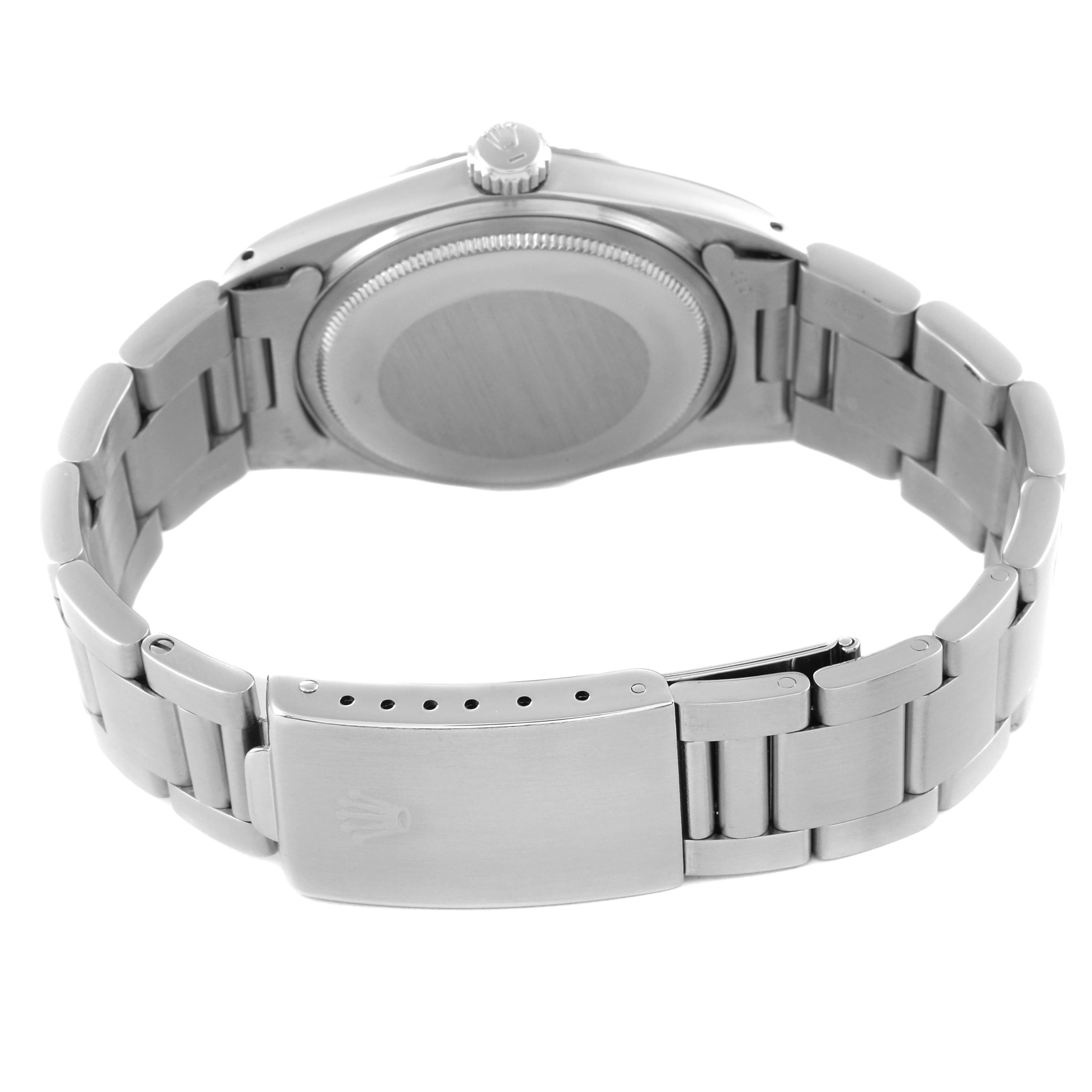 The image shows the back view of a Rolex Vintage Collection 1603 Men's Stainless Steel Silver Dial 1603 Men's Stainless Steel Silver Dial watch, highlighting the case back and bracelet clasp.