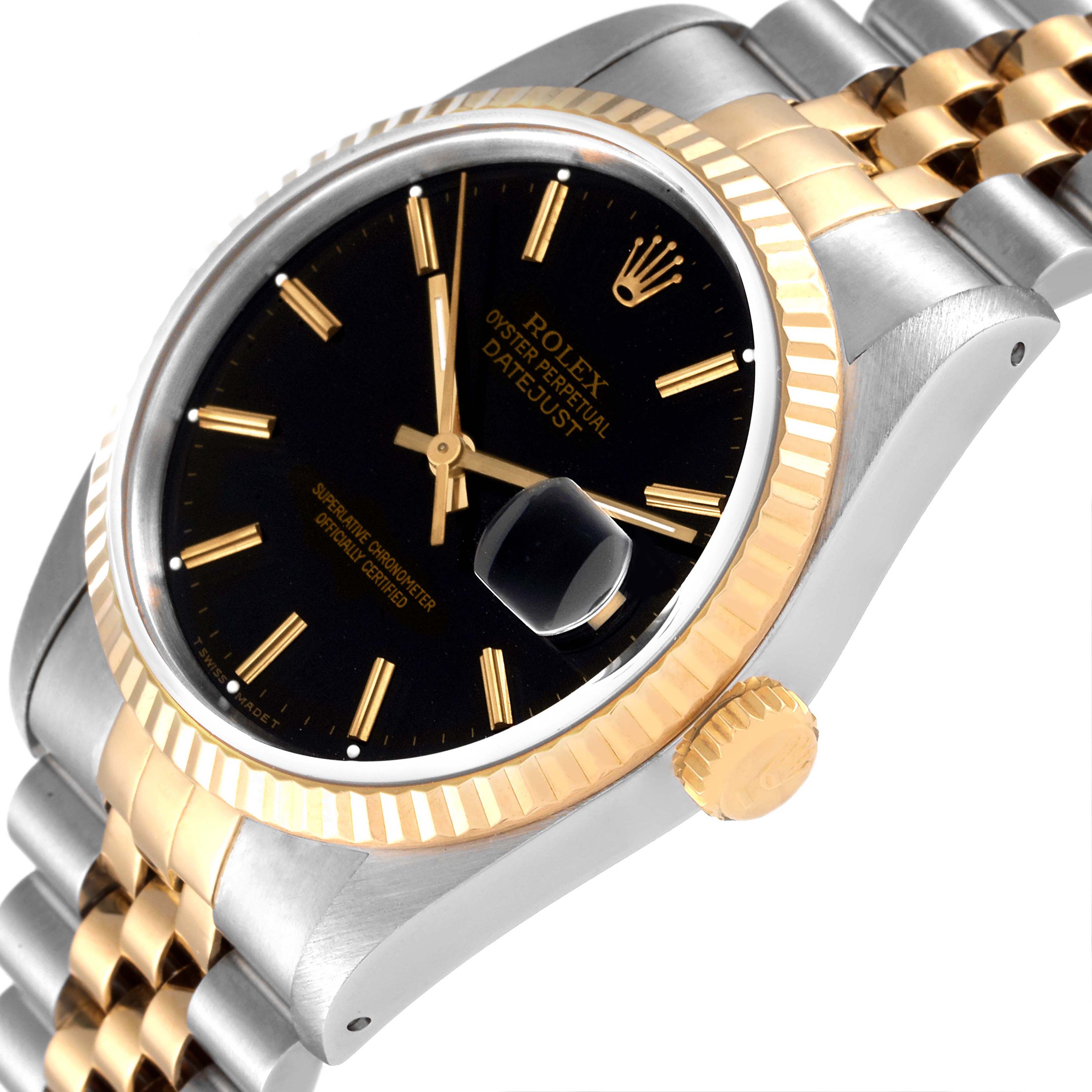 The image shows a Rolex Datejust 16233 Men's Steel and Gold (two tone) Black Dial 16233 Men's Steel and Gold (two tone) Black Dial watch at a slight angle, highlighting the bezel, crown, dial, and part of the bracelet.