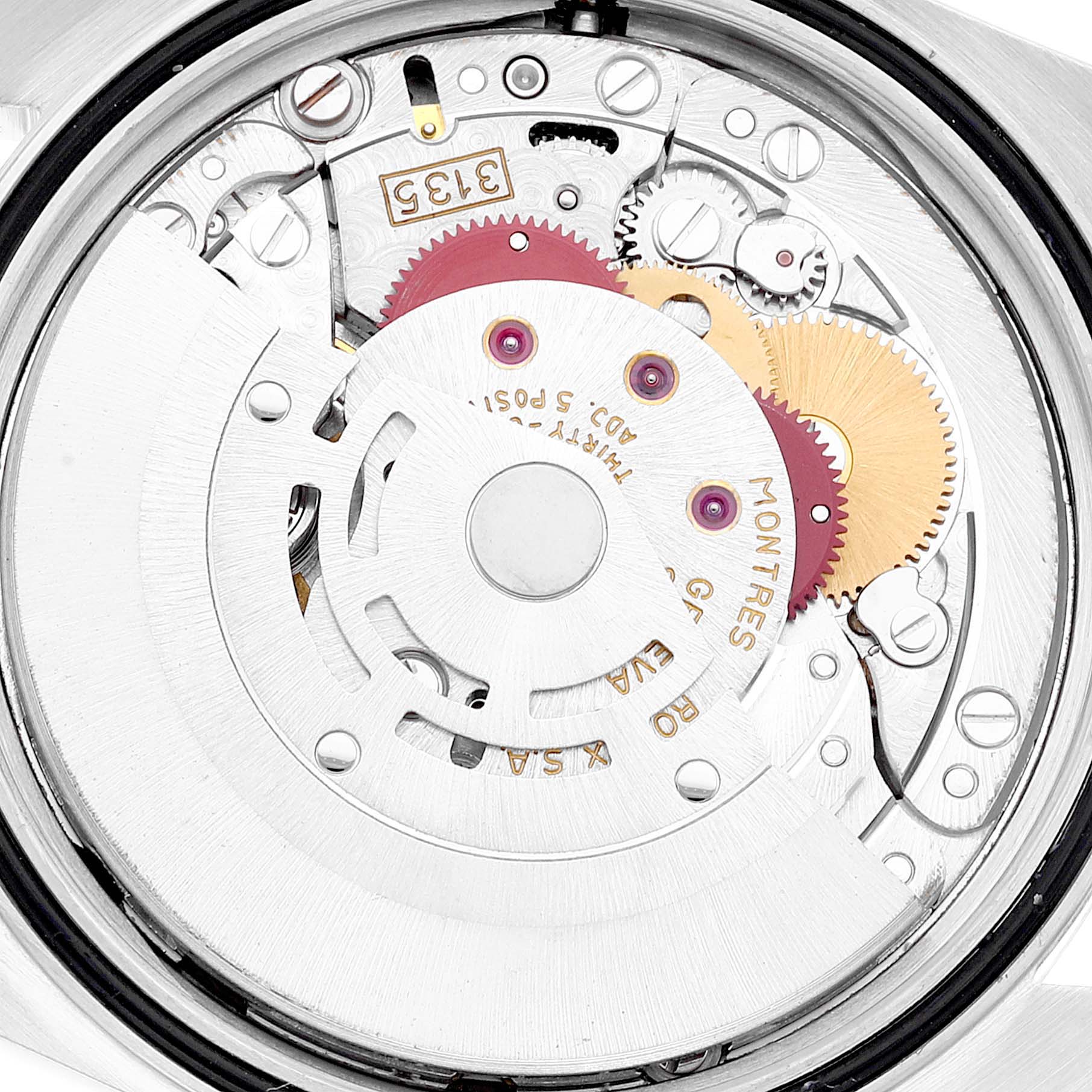 The image shows a close-up of the movement mechanism inside a Rolex Datejust 16233 Men's Steel and Gold (two tone) Black Dial 16233 Men's Steel and Gold (two tone) Black Dial watch, highlighting gears and components.