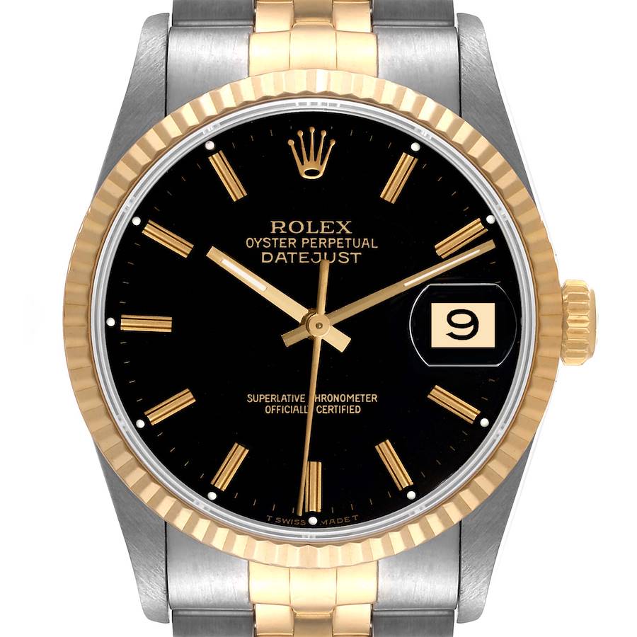 The image shows a front view of the Rolex Datejust watch, highlighting its black dial, gold hands, date display, and gold bezel.