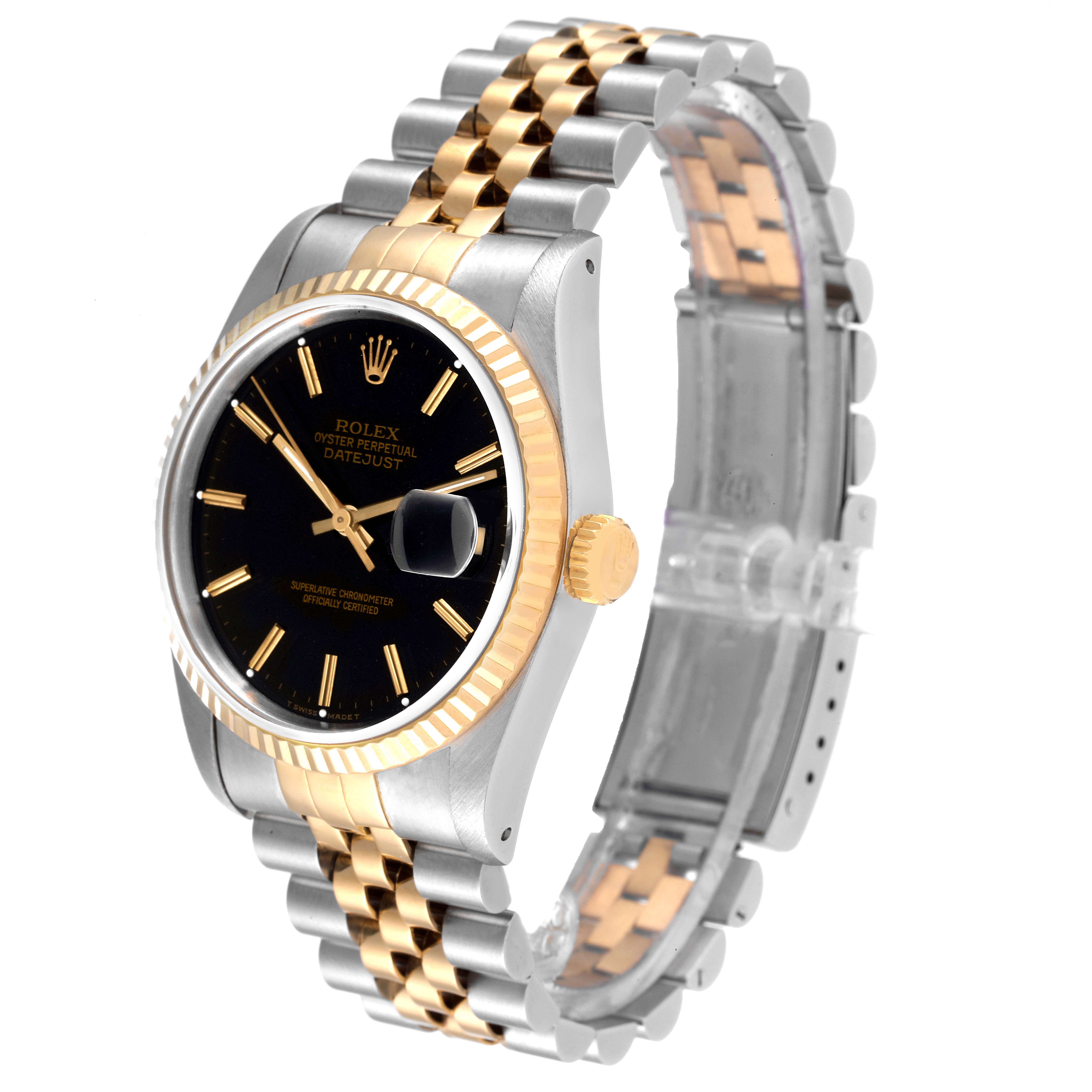 The Rolex Datejust 16233 Men's Steel and Gold (two tone) Black Dial 16233 Men's Steel and Gold (two tone) Black Dial watch is shown from an angled side view, highlighting the black dial, fluted bezel, and two-tone Jubilee bracelet.