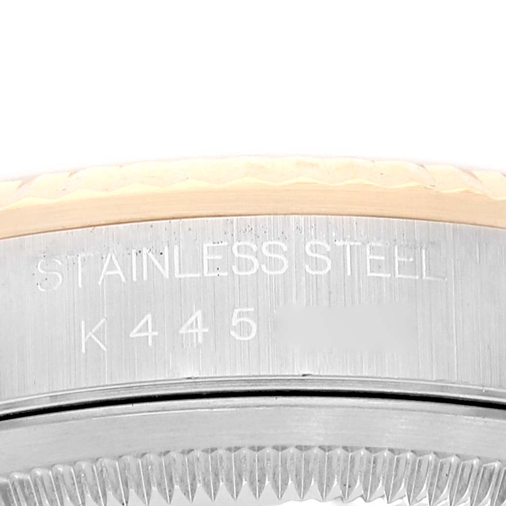 This image shows a close-up of the stainless steel casing with part of the bezel of the Rolex Datejust 16233 Men's Steel and Gold (two tone) White Dial 16233 Men's Steel and Gold (two tone) White Dial watch model.