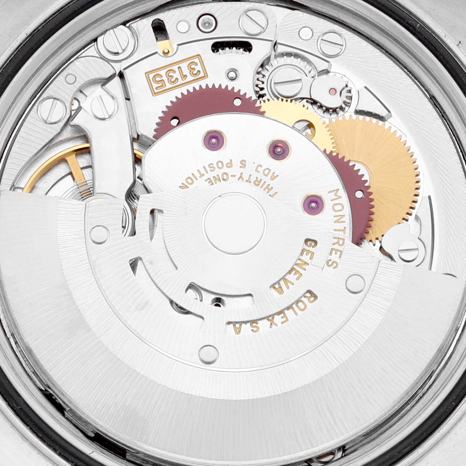 This image shows the intricate internal movement of the Rolex Datejust 16233 Men's Steel and Gold (two tone) Blue Dial 16233 Men's Steel and Gold (two tone) Blue Dial watch, highlighting gears and mechanisms from a close-up angle.