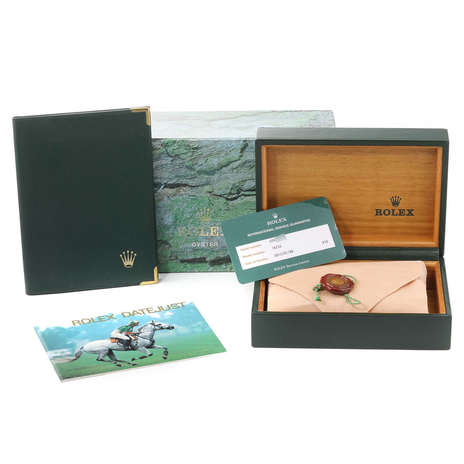 The image shows a Rolex Datejust 16233 Men's Steel and Gold (two tone) Blue Dial 16233 Men's Steel and Gold (two tone) Blue Dial box, warranty card, booklet, and other accessories viewed from a front angle.