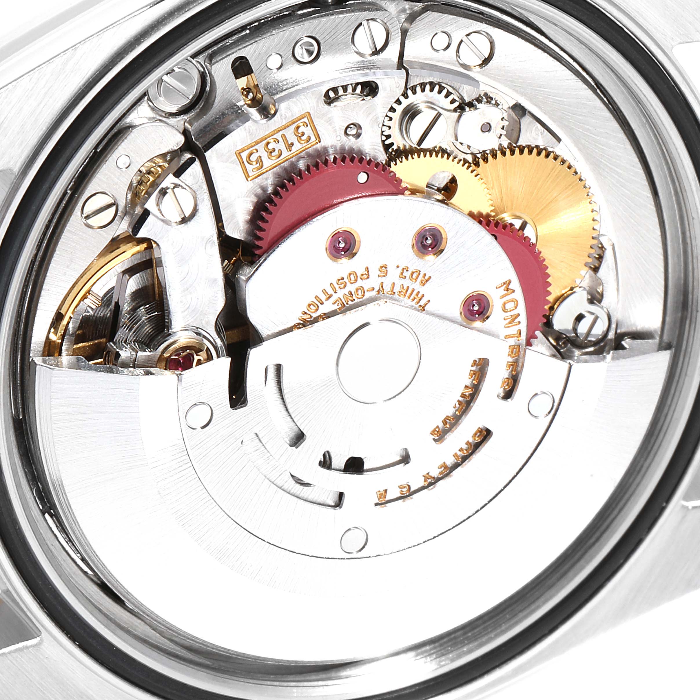 The image shows a close-up of the movement inside a Rolex Datejust 16233 Men
s Steel and Gold (two tone) Champagne Dial 16233 Men
s Steel and Gold (two tone) Champagne Dial watch, highlighting its intricate mechanical parts.