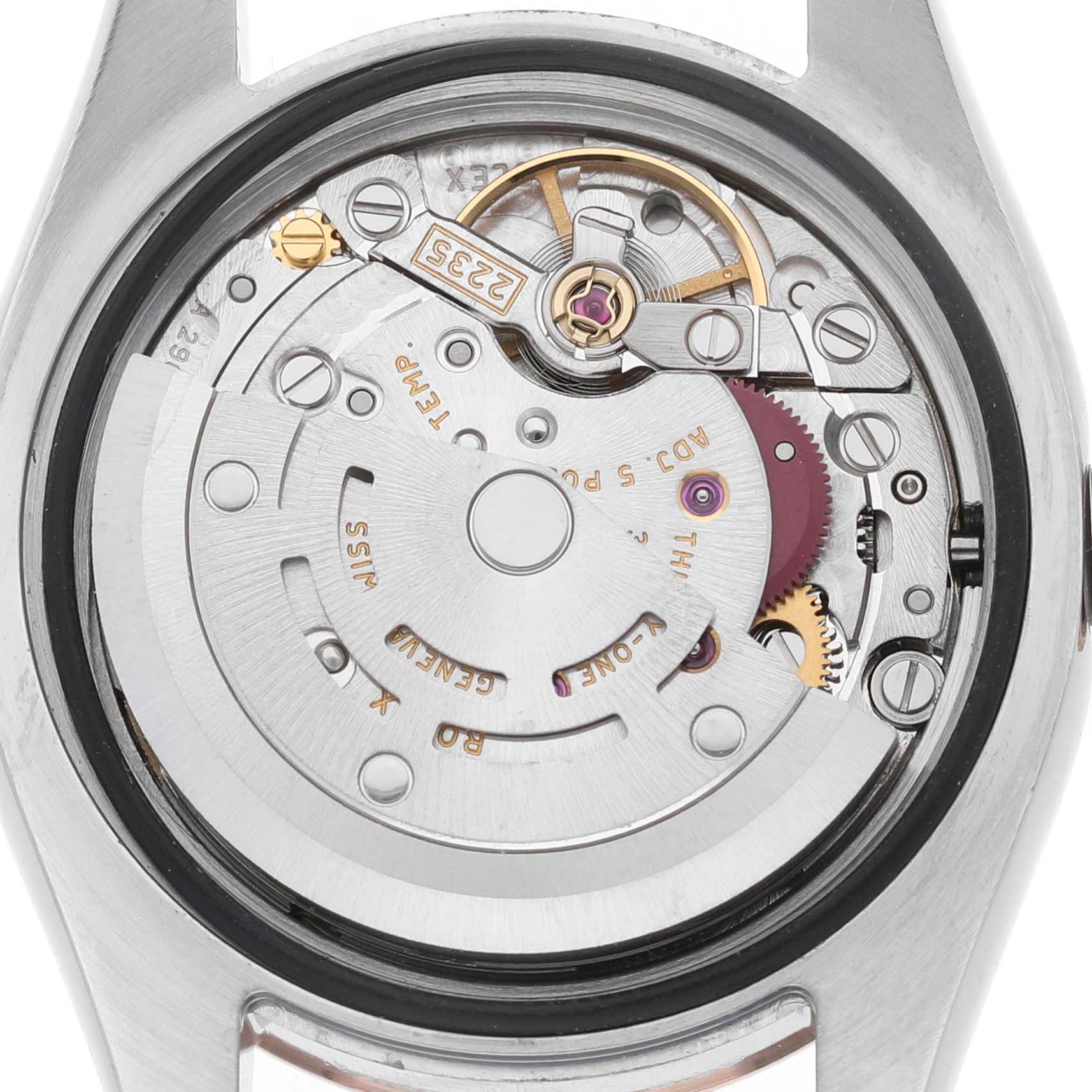 The image shows the movement mechanism of a Rolex Datejust 179171 Women's Stainless Steel Pink Dial watch from a back angle, highlighting gears and components.