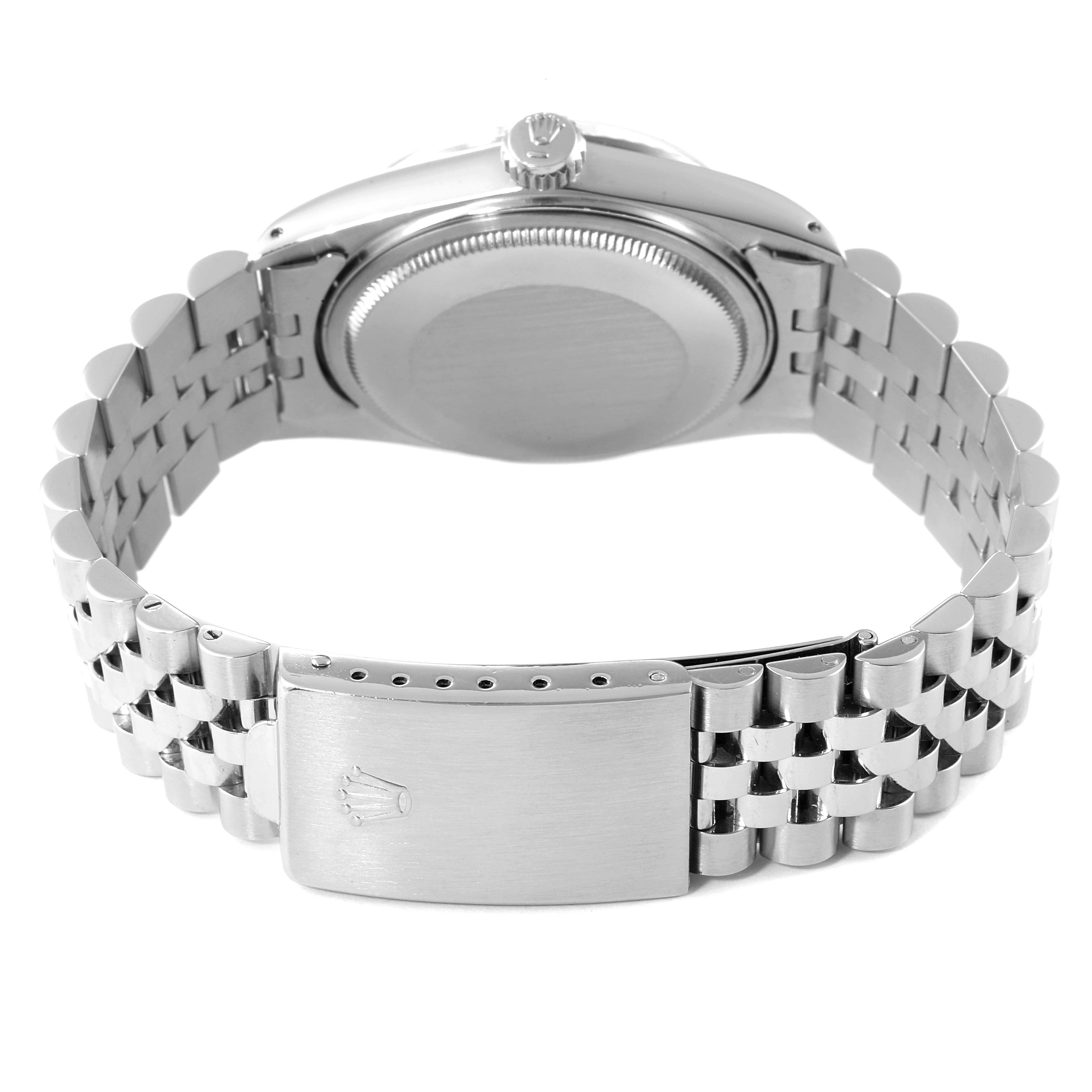 This image shows the clasp, bracelet, and case back of a Rolex Datejust 16014 Men
s Stainless Steel Silver Dial 16014 Men
s Stainless Steel Silver Dial watch from the rear view.