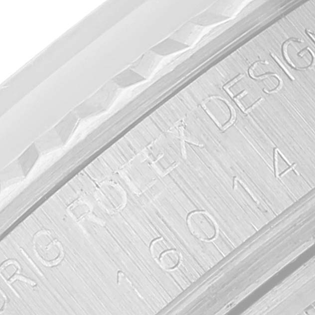 This image shows a close-up angle of the casing and engraved text on a Rolex Datejust 16014 Men
s Stainless Steel Silver Dial 16014 Men
s Stainless Steel Silver Dial watch.