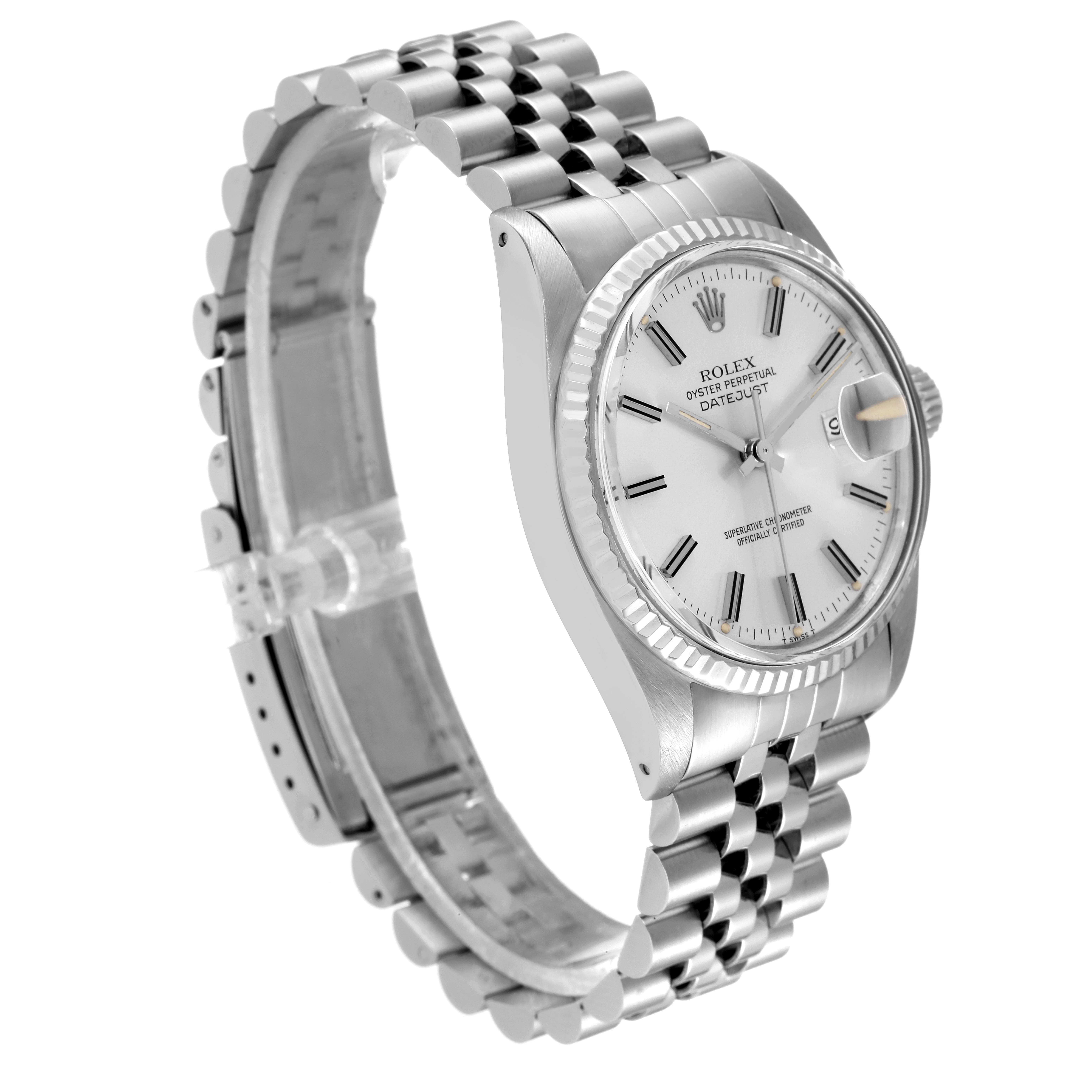 The image shows a side-angle view of a Rolex Datejust 16014 Men
s Stainless Steel Silver Dial 16014 Men
s Stainless Steel Silver Dial watch, highlighting its silver case, white dial, and metal link bracelet.
