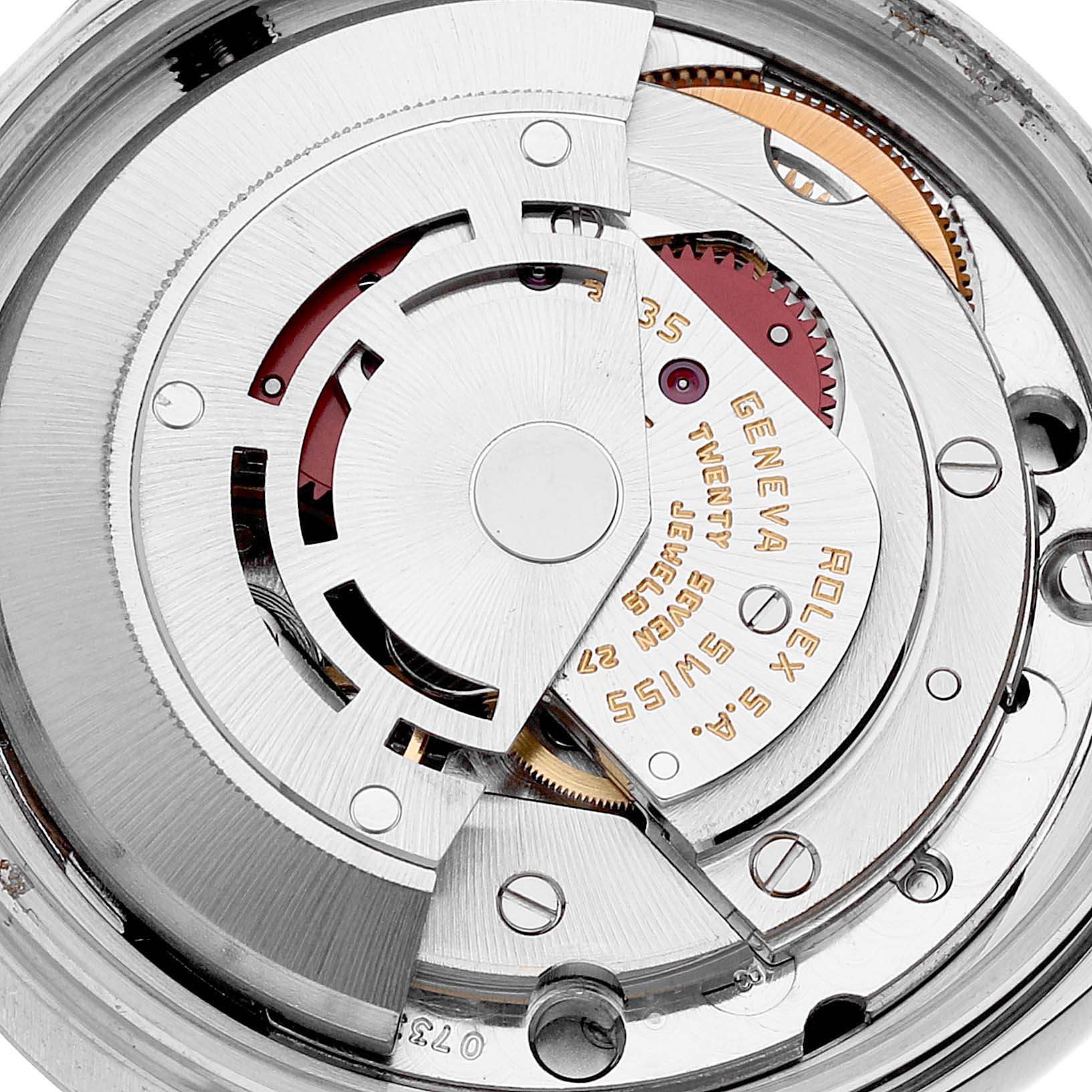 The image shows an internal view of the Rolex Datejust 16014 Men
s Stainless Steel Silver Dial 16014 Men
s Stainless Steel Silver Dial watch, highlighting the movement and mechanism.