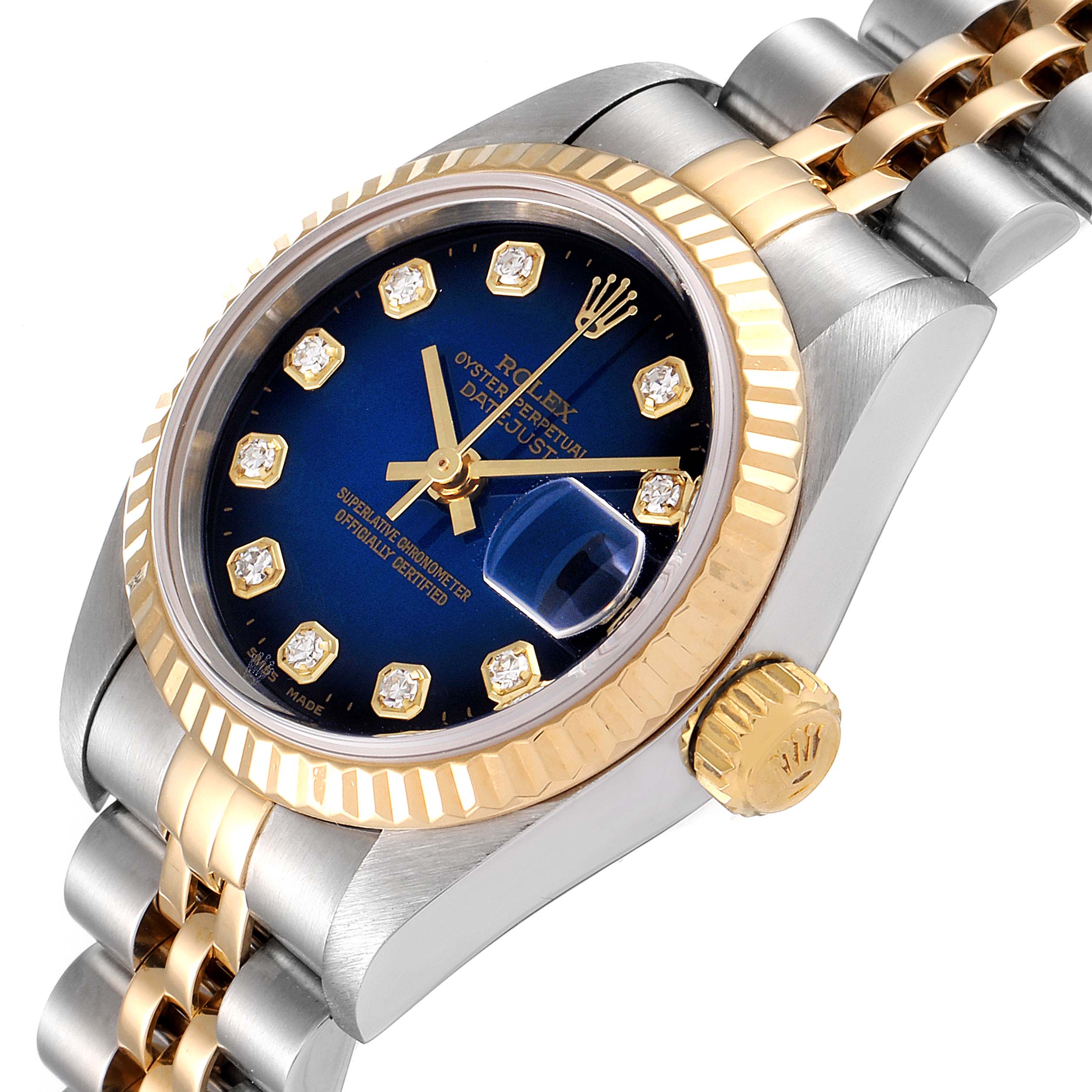 The image shows a close-up angle of a Rolex Datejust 79173 Women's Steel and Gold (two tone) Blue Dial 79173 Women's Steel and Gold (two tone) Blue Dial watch, highlighting its blue dial, diamond hour markers, and two-tone bracelet.