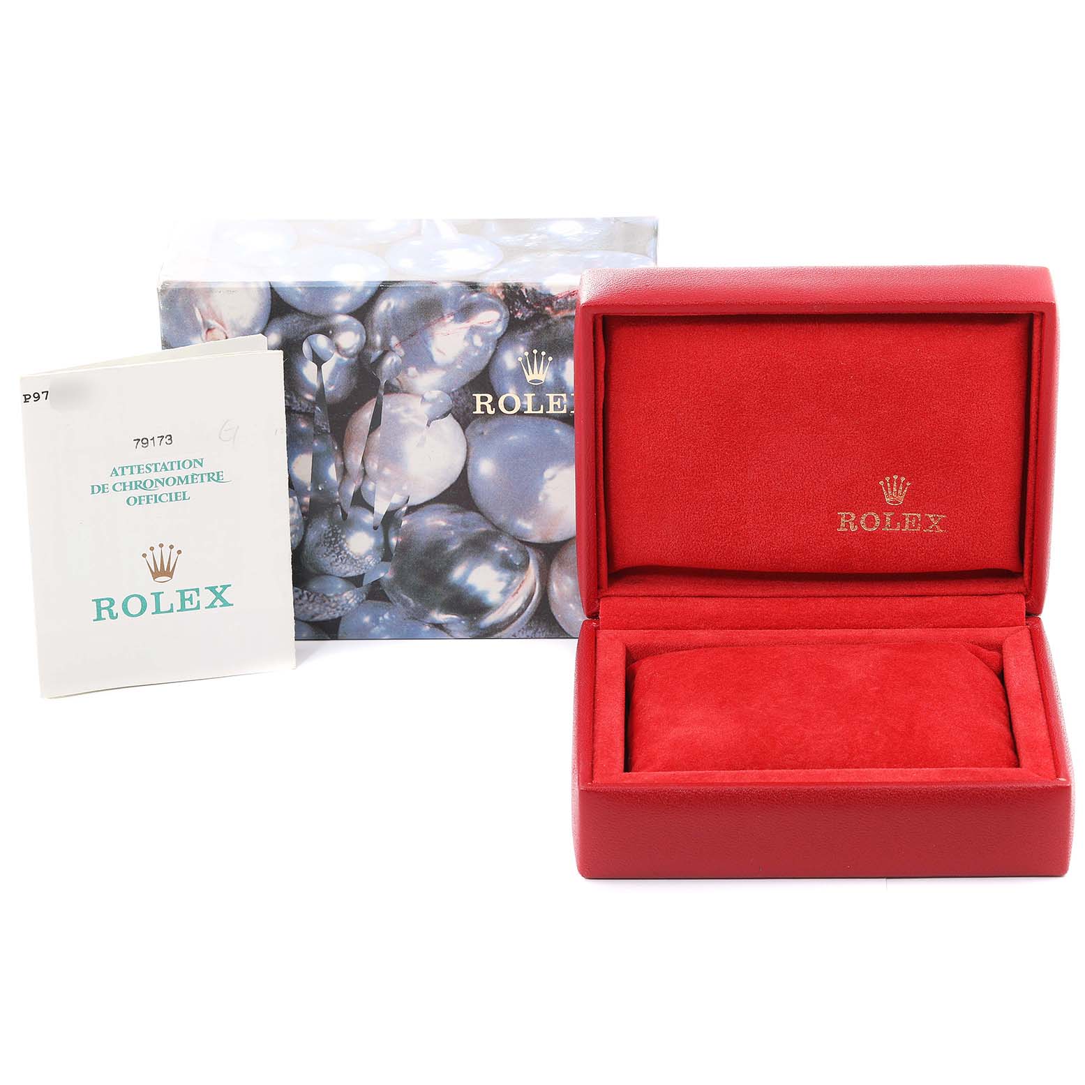 The image shows a red Rolex Datejust 79173 Women's Steel and Gold (two tone) Champagne Dial 79173 Women's Steel and Gold (two tone) Champagne Dial watch box, a certificate booklet, and an outer box with a pearl design.