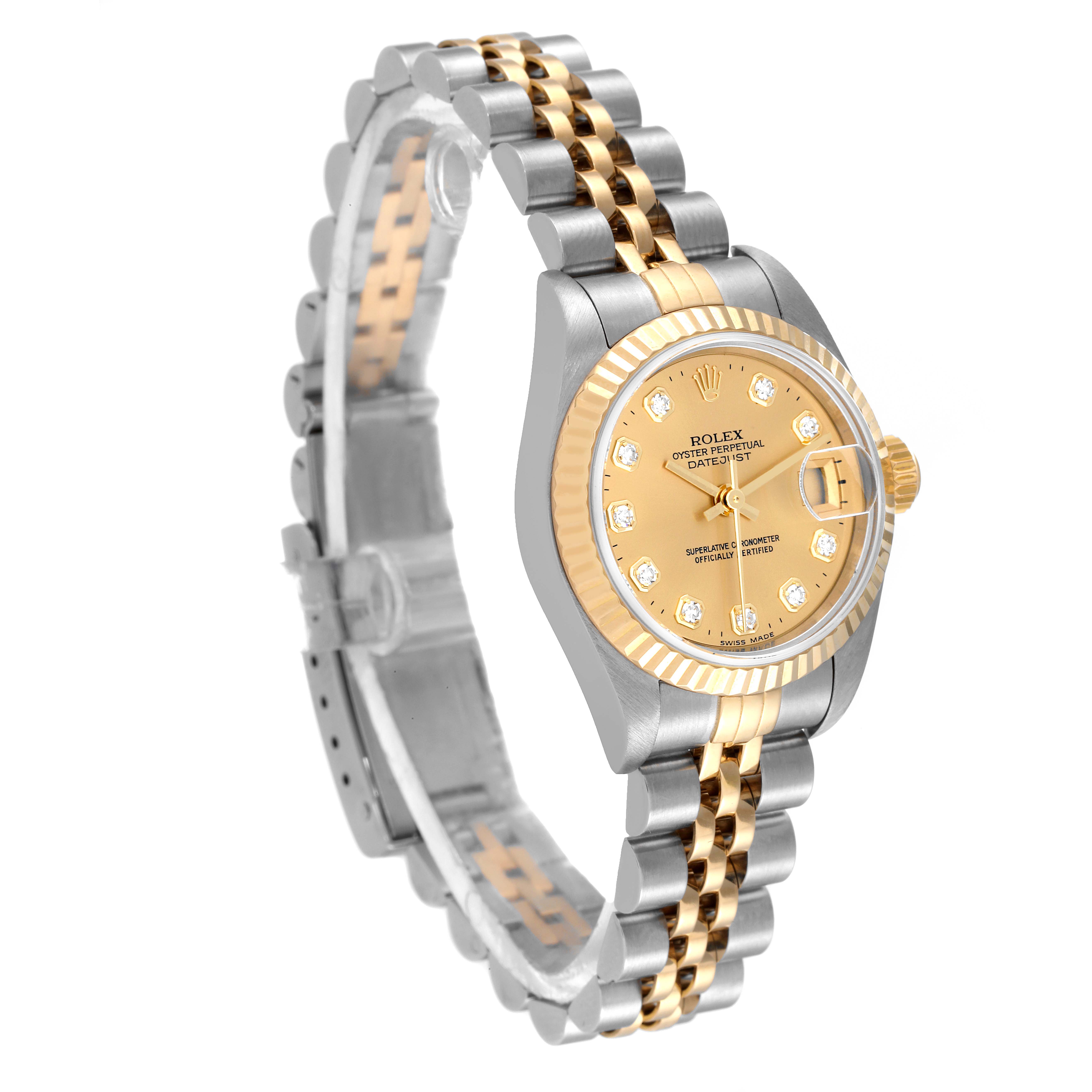 The Rolex Datejust 79173 Women's Steel and Gold (two tone) Champagne Dial 79173 Women's Steel and Gold (two tone) Champagne Dial watch is shown at a three-quarter angle, highlighting its gold dial, fluted bezel, and two-tone bracelet.