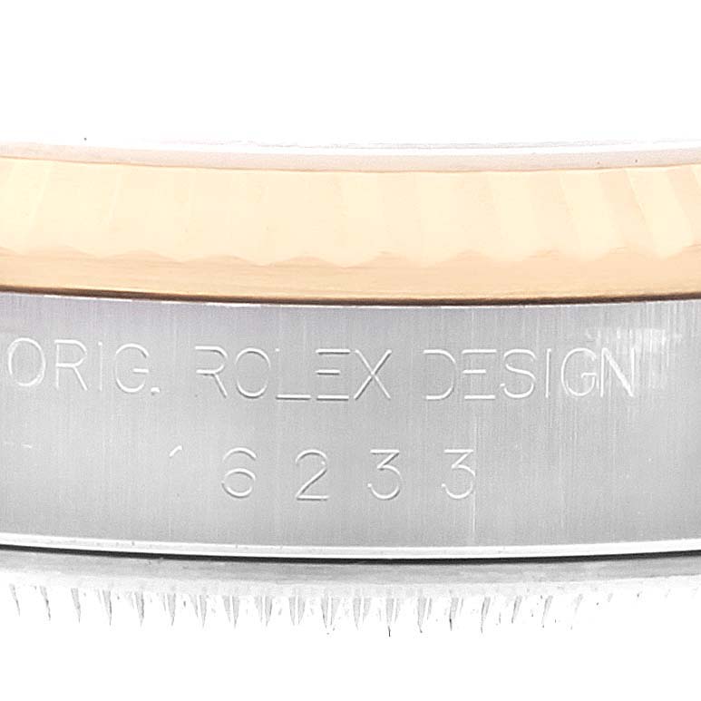 This image shows a close-up side view of the case and bezel, detailing the "Orig. Rolex Design" and the model number 16233 of a Rolex Datejust 16233 Men's Steel and Gold (two tone) Champagne Dial 16233 Men's Steel and Gold (two tone) Champagne Dial.
