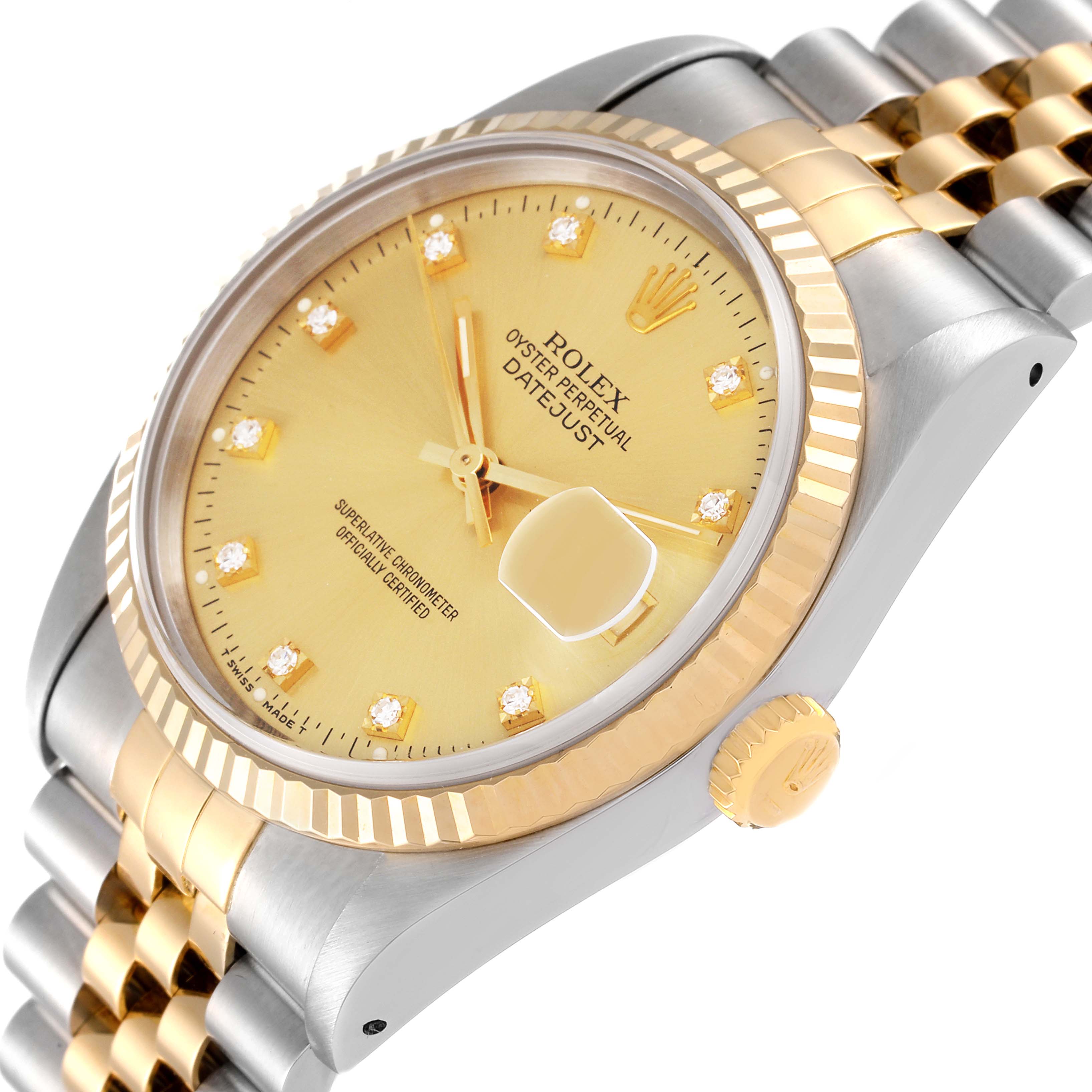 This image shows the Rolex Datejust 16233 Men's Steel and Gold (two tone) Champagne Dial 16233 Men's Steel and Gold (two tone) Champagne Dial watch from an angled close-up, highlighting its gold dial, bezel, crown, and two-tone bracelet.