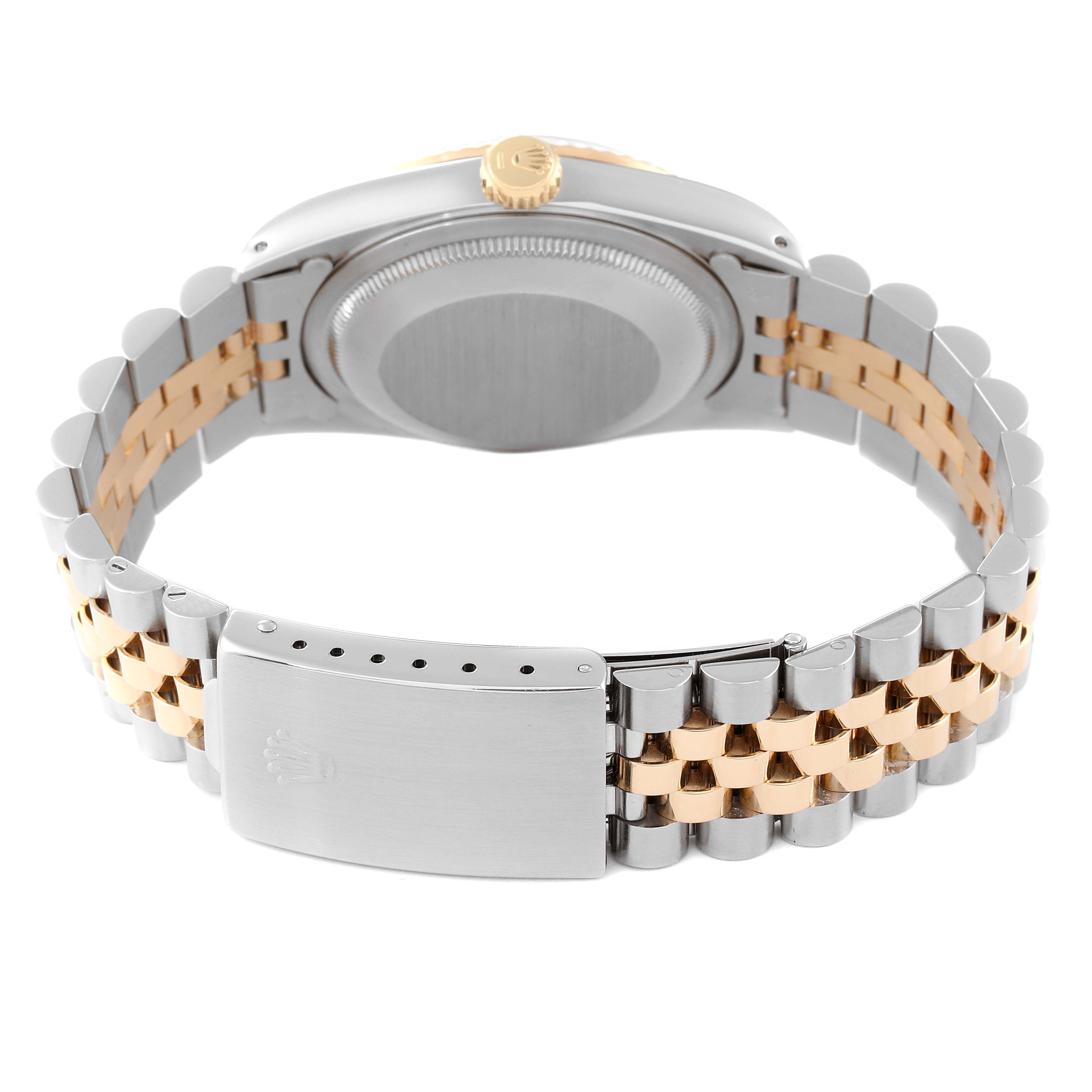 This image shows the back view of a Rolex Datejust 16233 Men's Steel and Gold (two tone) Champagne Dial 16233 Men's Steel and Gold (two tone) Champagne Dial watch, highlighting its two-tone bracelet and clasp.