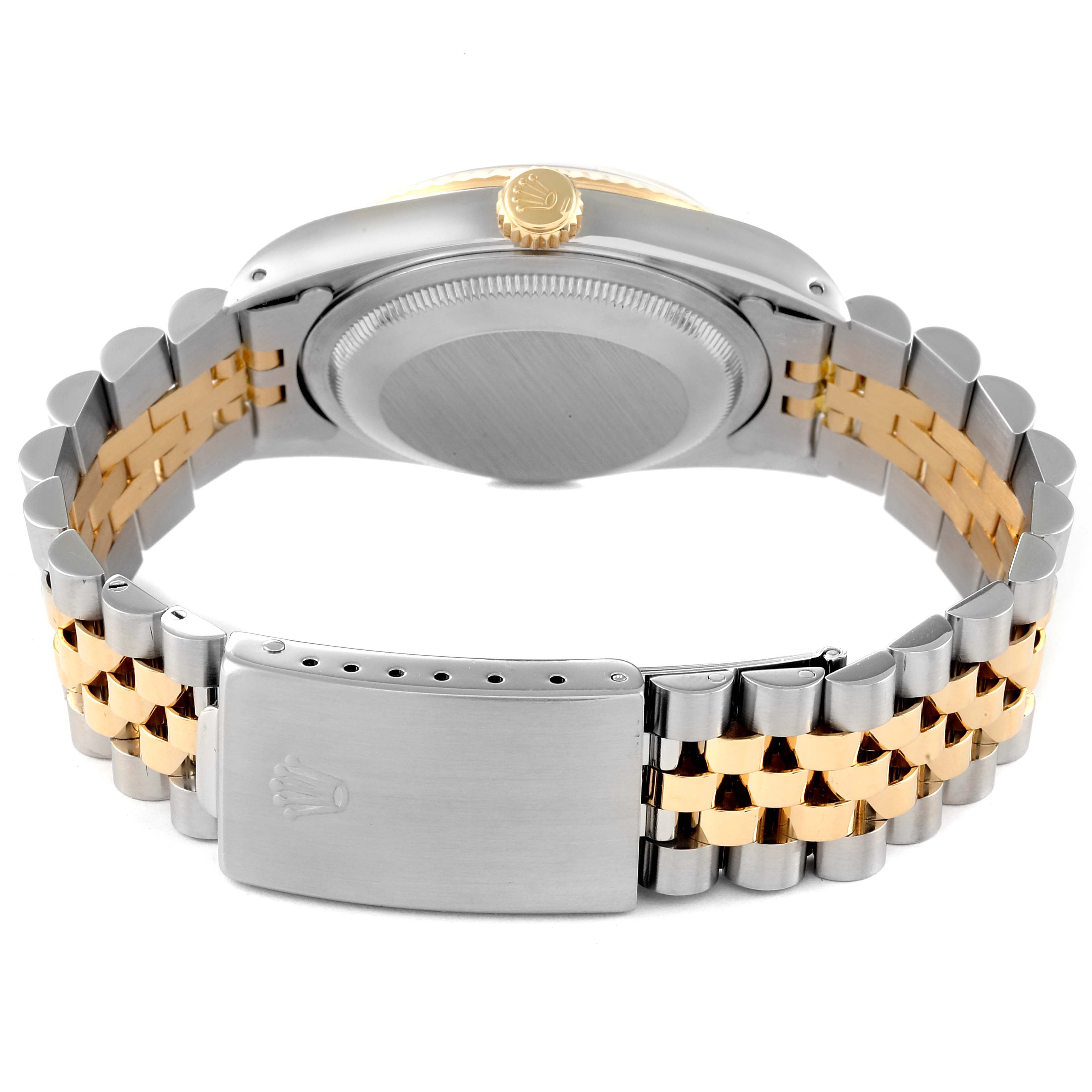 The image shows the backside of a Rolex Datejust 16233 Men's Steel and Gold (two tone) Champagne Dial 16233 Men's Steel and Gold (two tone) Champagne Dial watch, highlighting its two-tone bracelet and clasp.