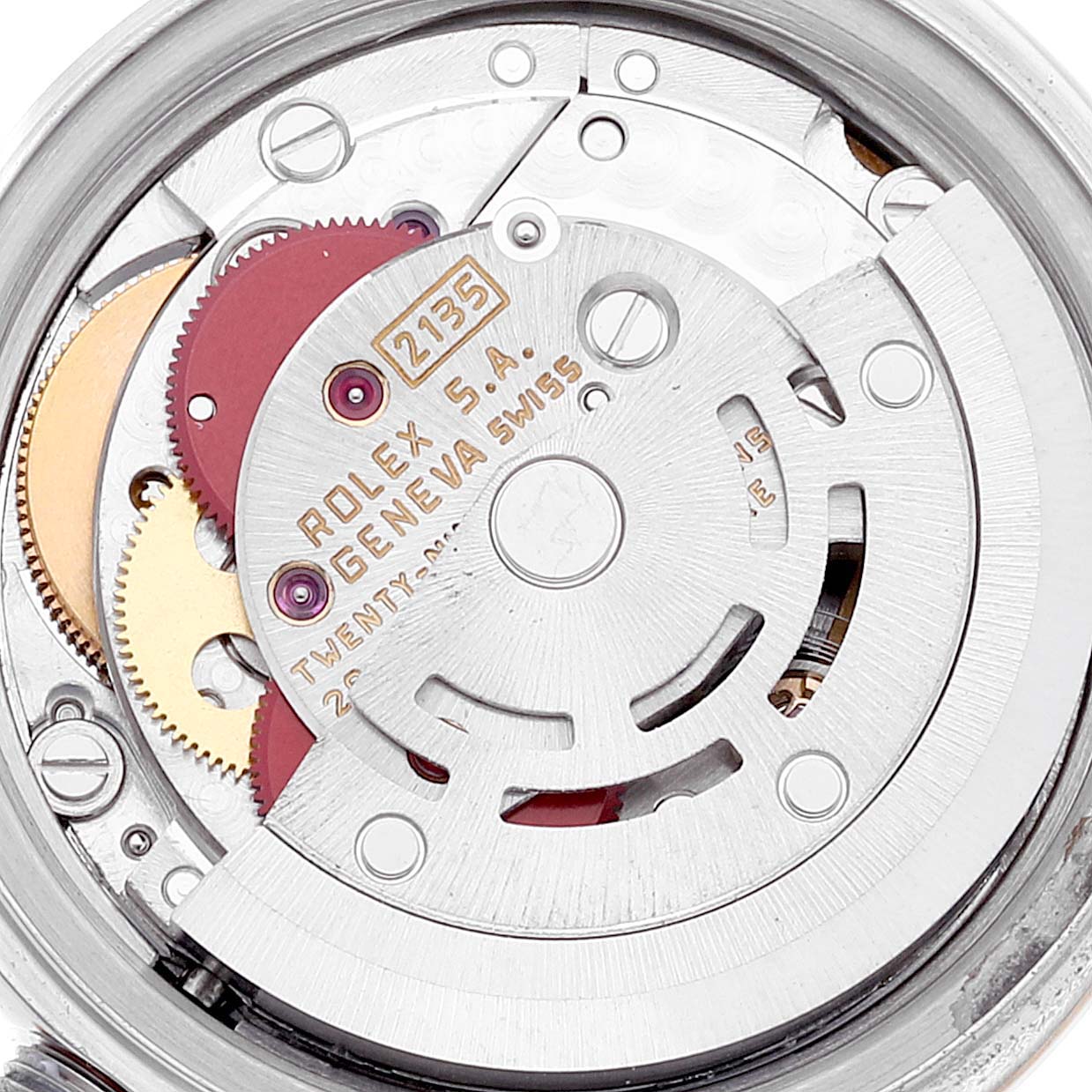 The image shows the intricate movements and inner mechanism of a Rolex Datejust 69173 Women's Steel and Gold (two tone) Champagne Dial 69173 Women's Steel and Gold (two tone) Champagne Dial watch.