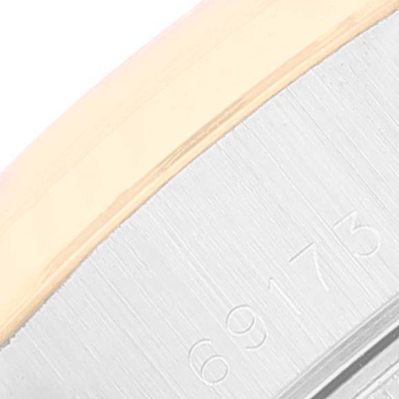This image shows a close-up view of the side of a Rolex Datejust 69173 Women's Steel and Gold (two tone) Champagne Dial 69173 Women's Steel and Gold (two tone) Champagne Dial watch, focusing on the casing with the model number 69173 visible.