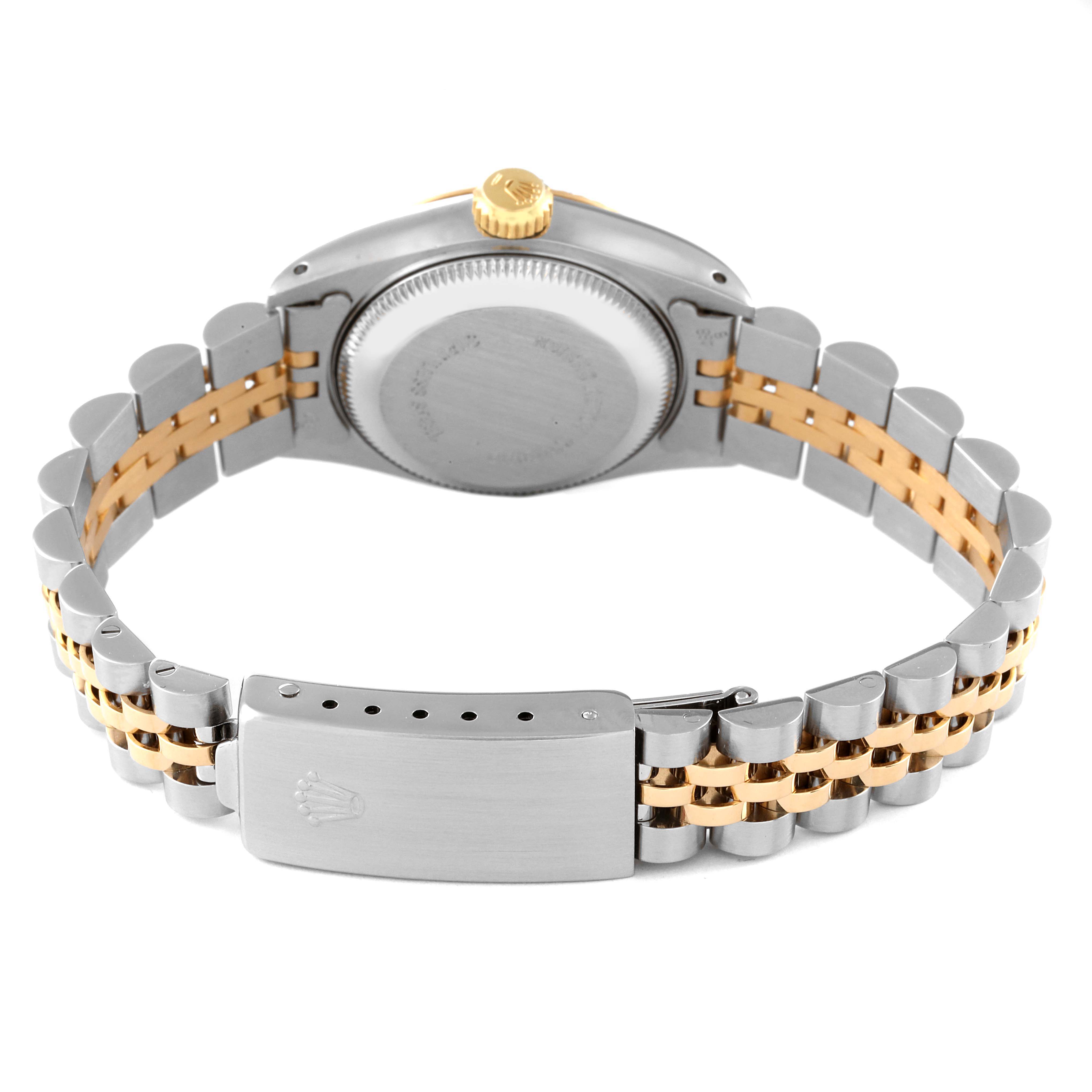 The image shows the back case and bracelet of a Rolex Datejust 69173 Women's Steel and Gold (two tone) Champagne Dial 69173 Women's Steel and Gold (two tone) Champagne Dial watch, showcasing its two-tone metal design and clasp.