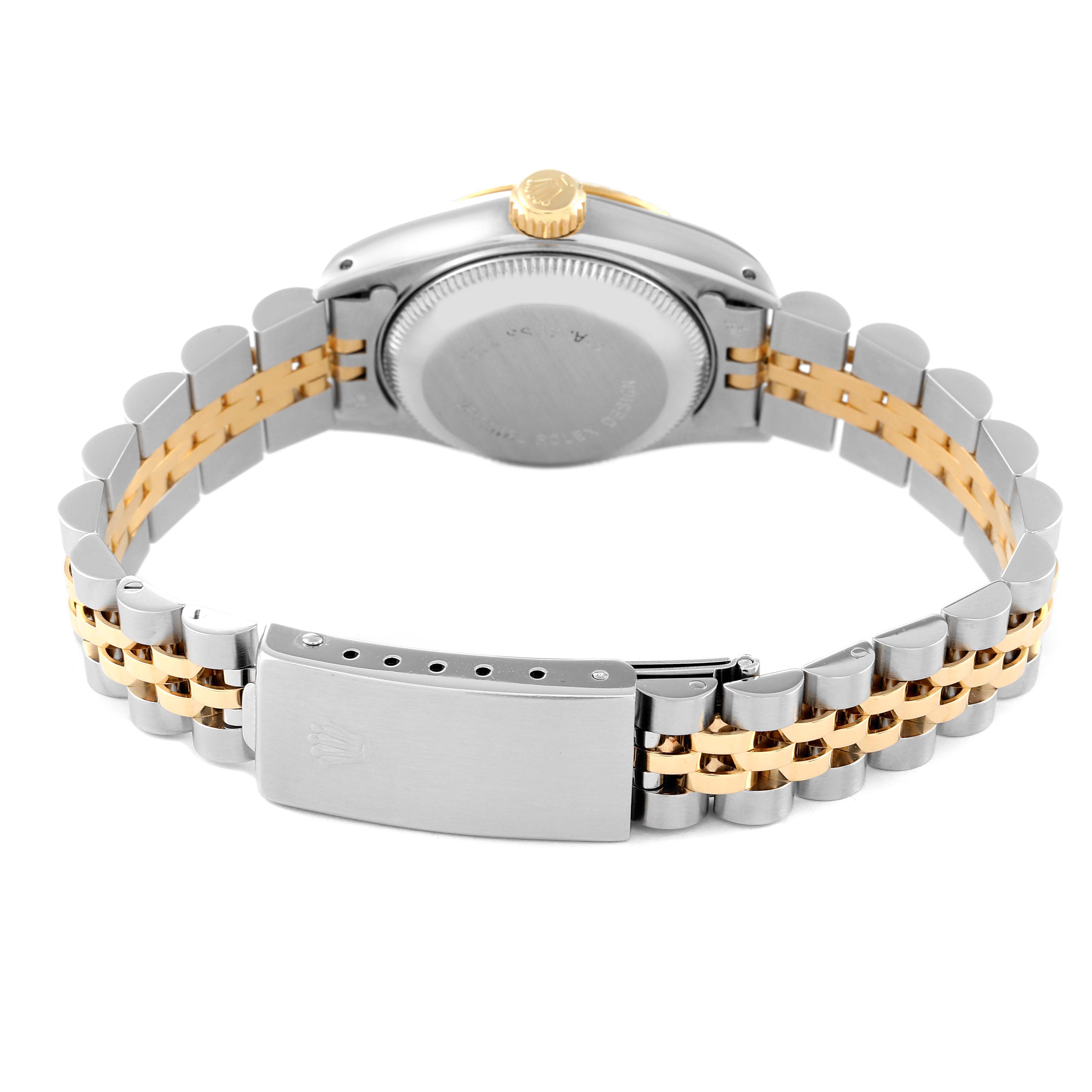 The image shows the back of a Rolex Datejust 69173 Women's Steel and Gold (two tone) Champagne Dial 69173 Women's Steel and Gold (two tone) Champagne Dial watch highlighting its clasp, bracelet, and case back.