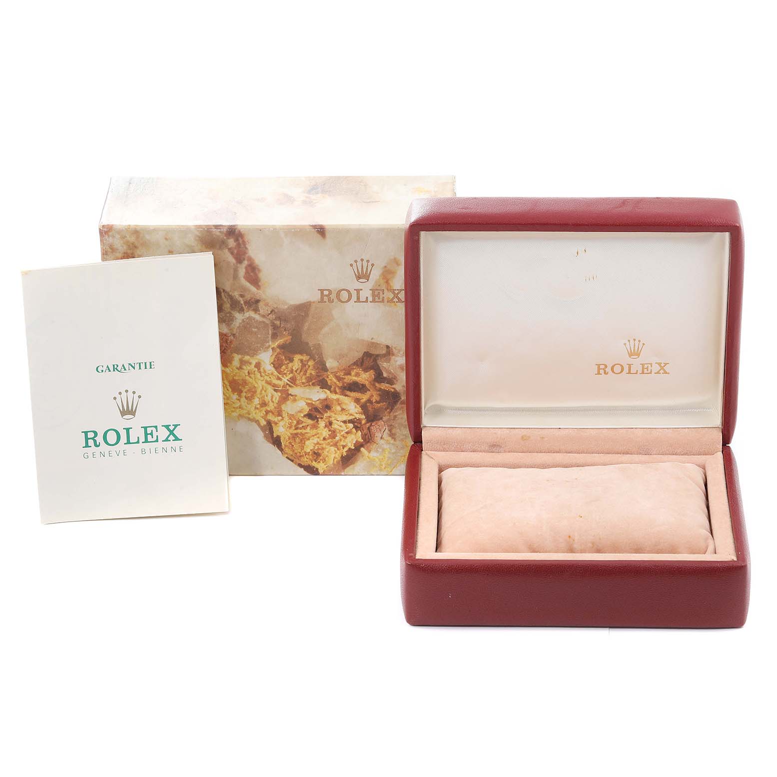 This image shows the packaging and guarantee card for a Rolex Datejust 69173 Women's Steel and Gold (two tone) Champagne Dial 69173 Women's Steel and Gold (two tone) Champagne Dial watch.