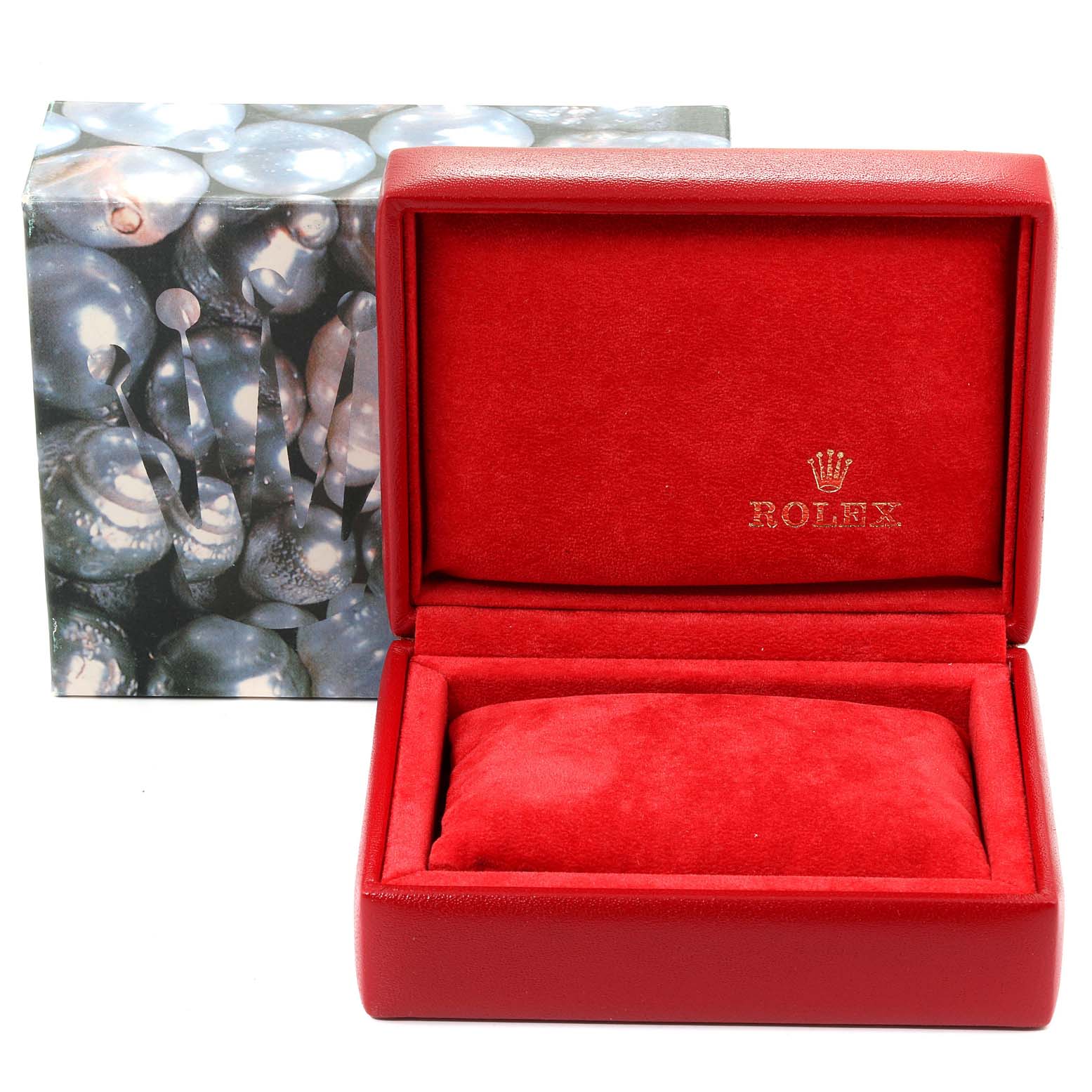 The image shows an empty red Rolex watch box for the Oyster Perpetual model, along with its outer packaging.