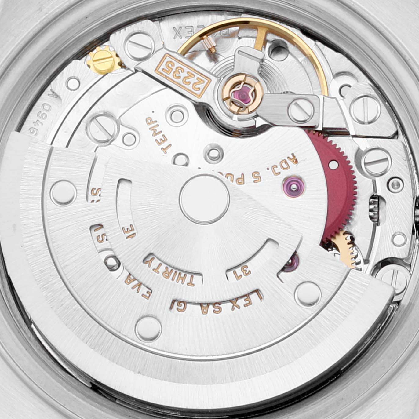This image shows a close-up of the movement mechanism inside a Rolex Datejust 79173 Women's Steel and Gold (two tone) White Dial 79173 Women's Steel and Gold (two tone) White Dial watch.