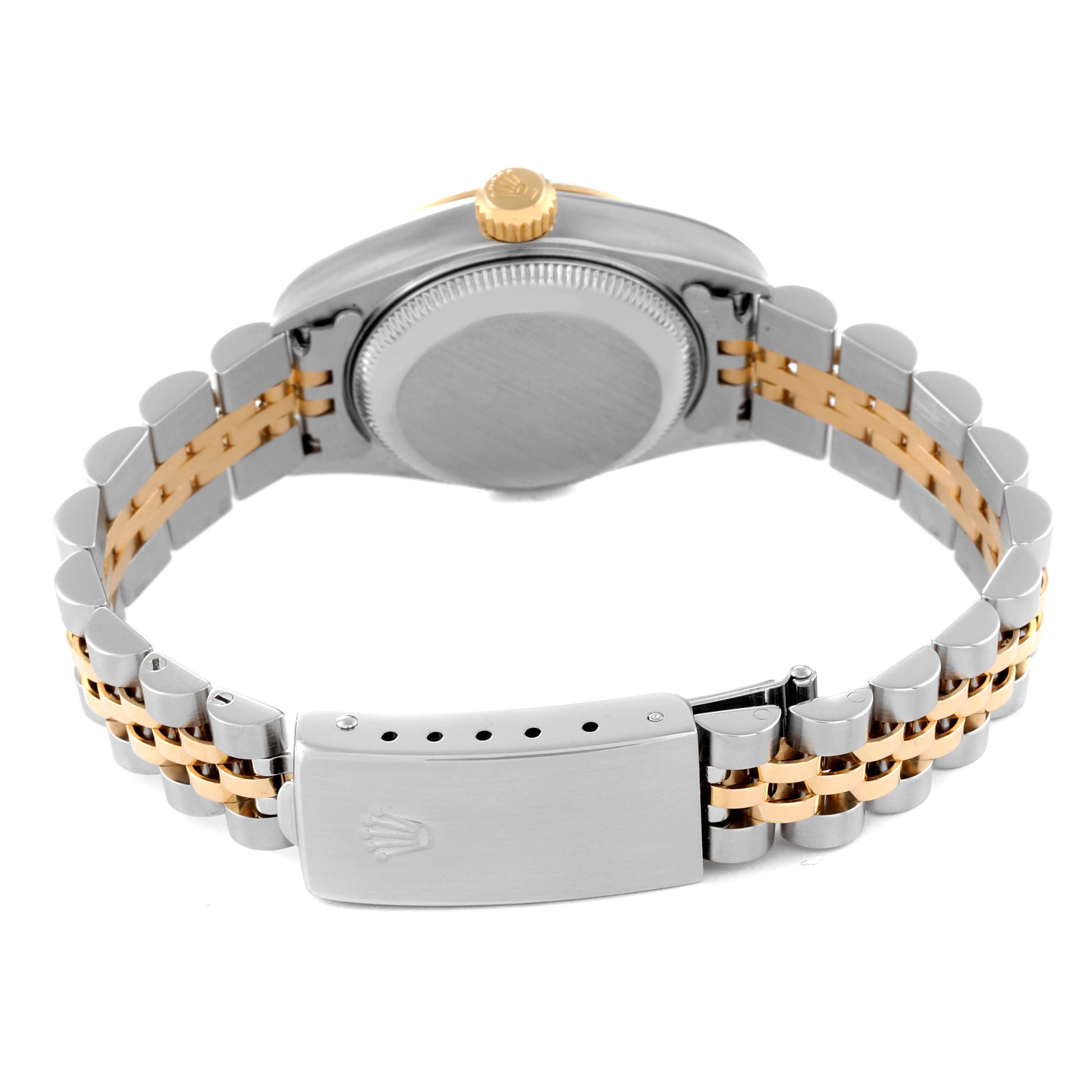 The image shows the back view of a Rolex Datejust 79173 Women's Steel and Gold (two tone) White Dial 79173 Women's Steel and Gold (two tone) White Dial watch, highlighting the clasp and bracelet with a two-tone design.