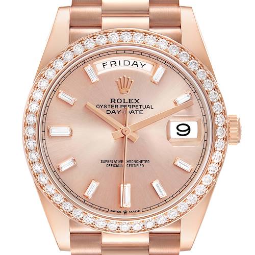 The Rolex President 228345 Men's Rose Gold Pink Dial model is shown from a front angle, highlighting the diamond bezel, dial, day and date displays.
