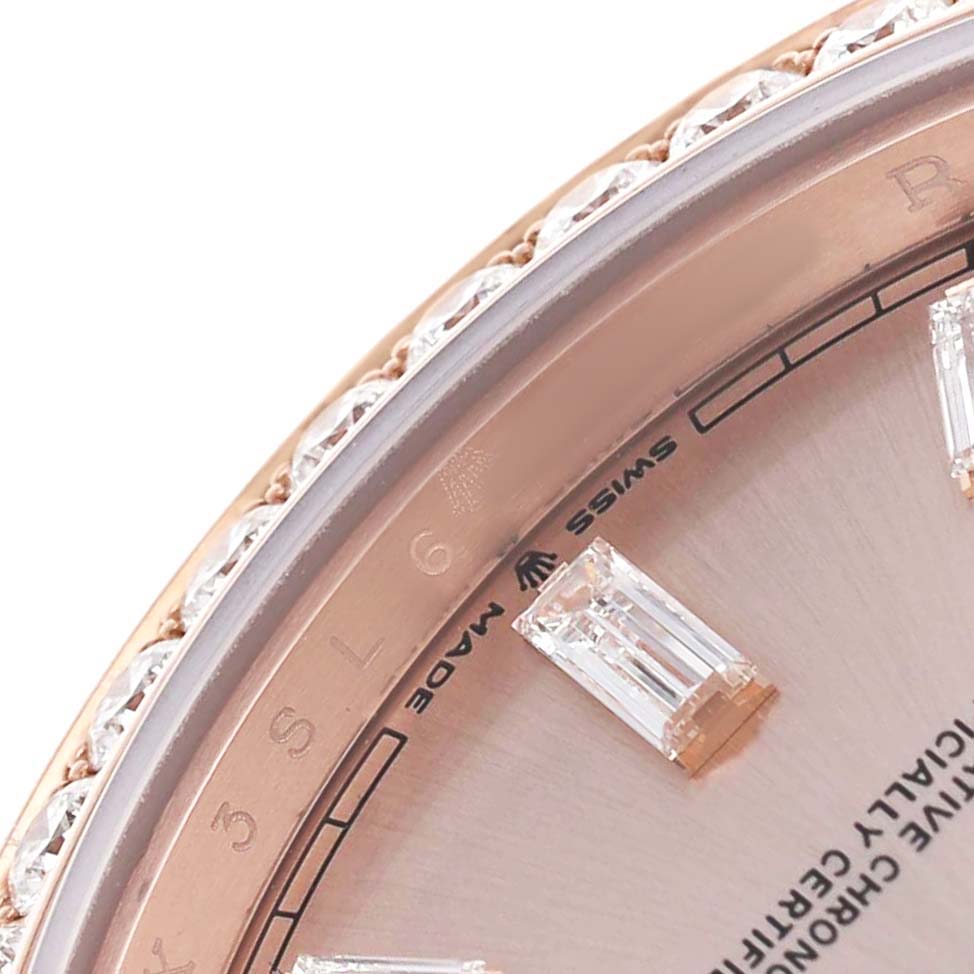 The image shows a close-up of the Rolex President 228345 Men's Rose Gold Pink Dial watch's dial edge, bezel, and diamond markers, viewed from an angled perspective.