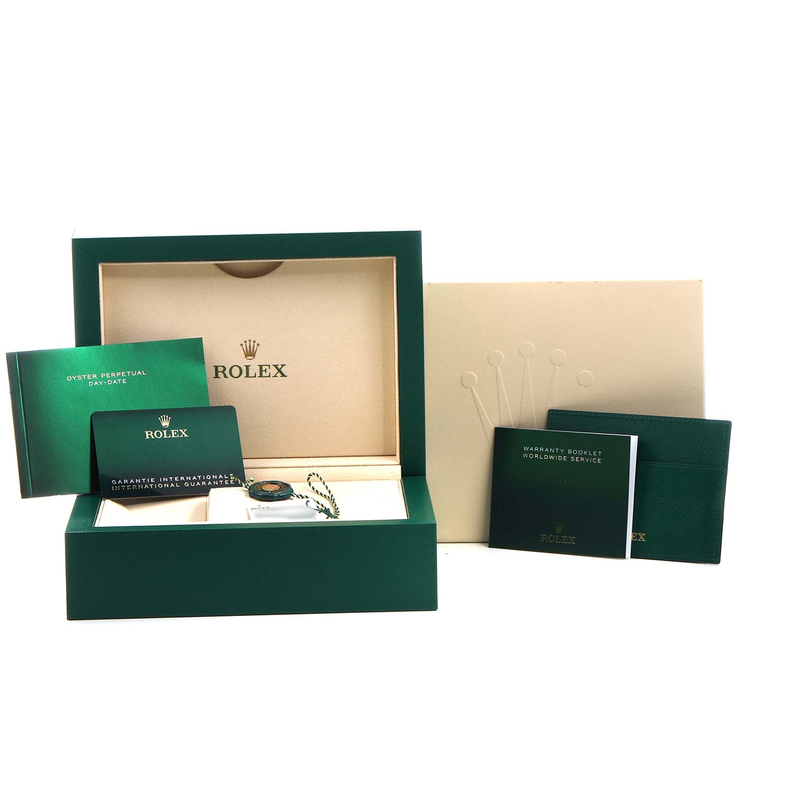 The image shows a Rolex President 228345 Men's Rose Gold Pink Dial model packaging with a green box, booklets, and a manual.