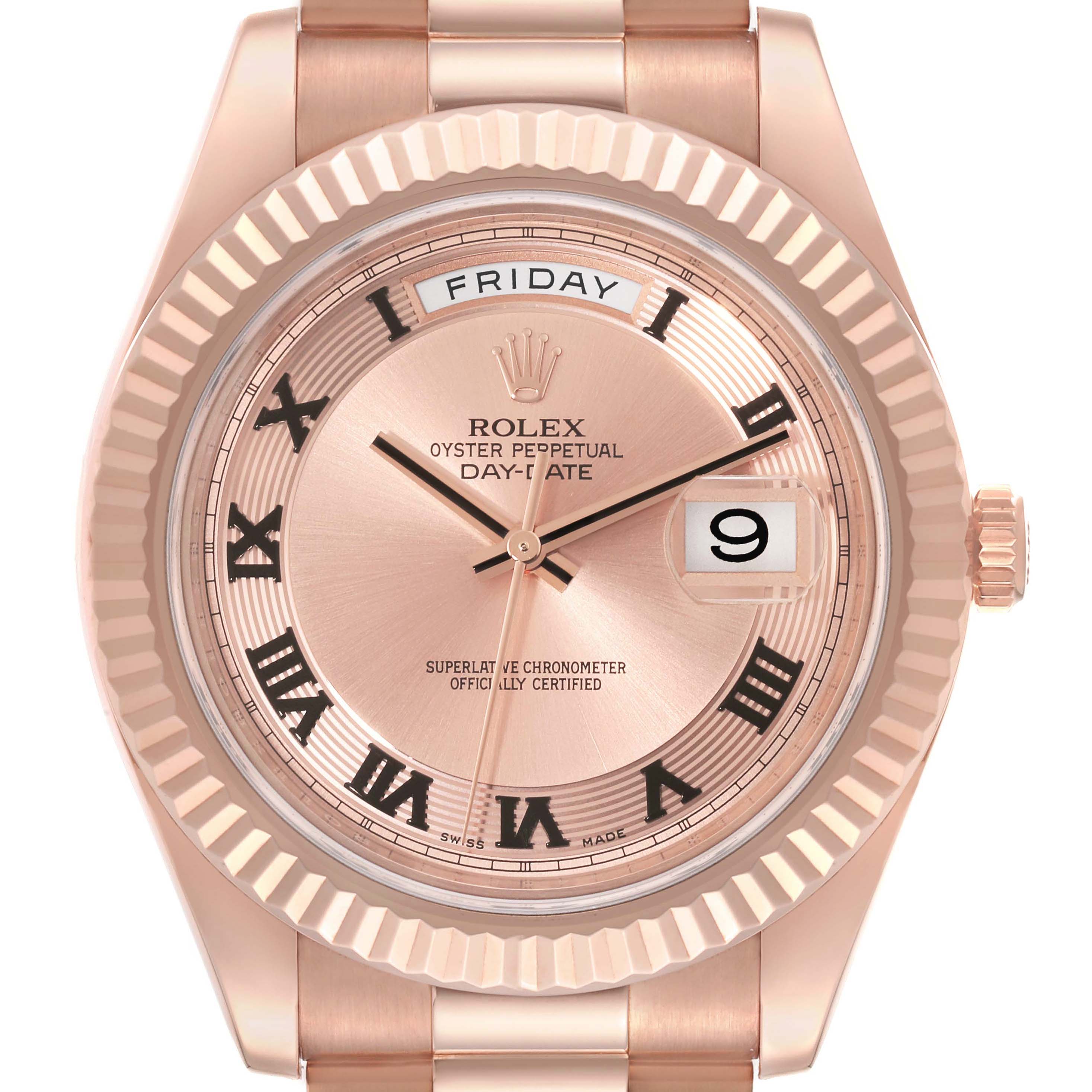 The Rolex President 218235 Men's Rose Gold Champagne Dial 218235 Men's Rose Gold Champagne Dial model is shown from the front, displaying the dial, day, date, and the fluted bezel.