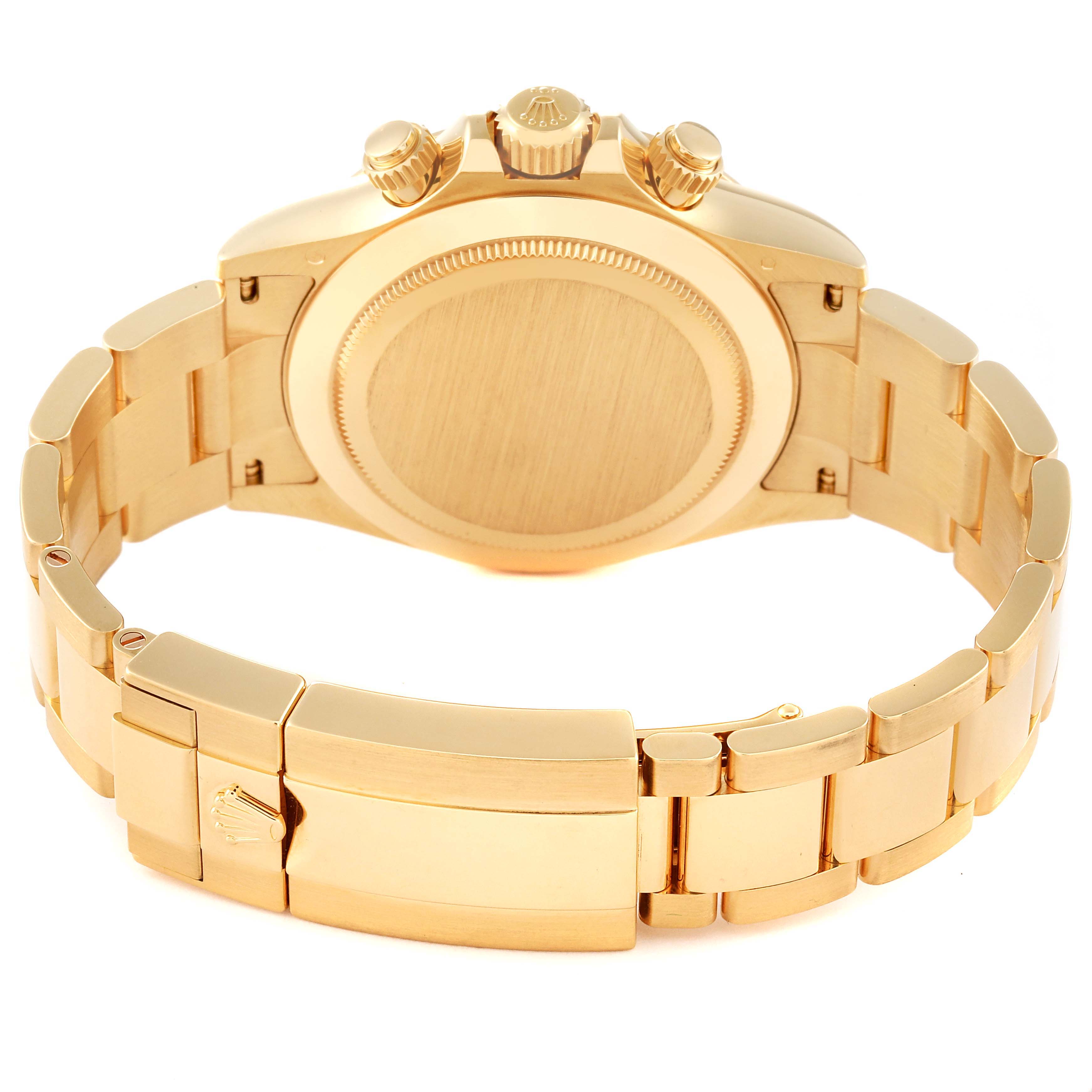 The image shows the Rolex Daytona 116508 Men's Yellow Gold Black Dial 116508 Men's Yellow Gold Black Dial watch from the back and partial view of its bracelet and clasp.