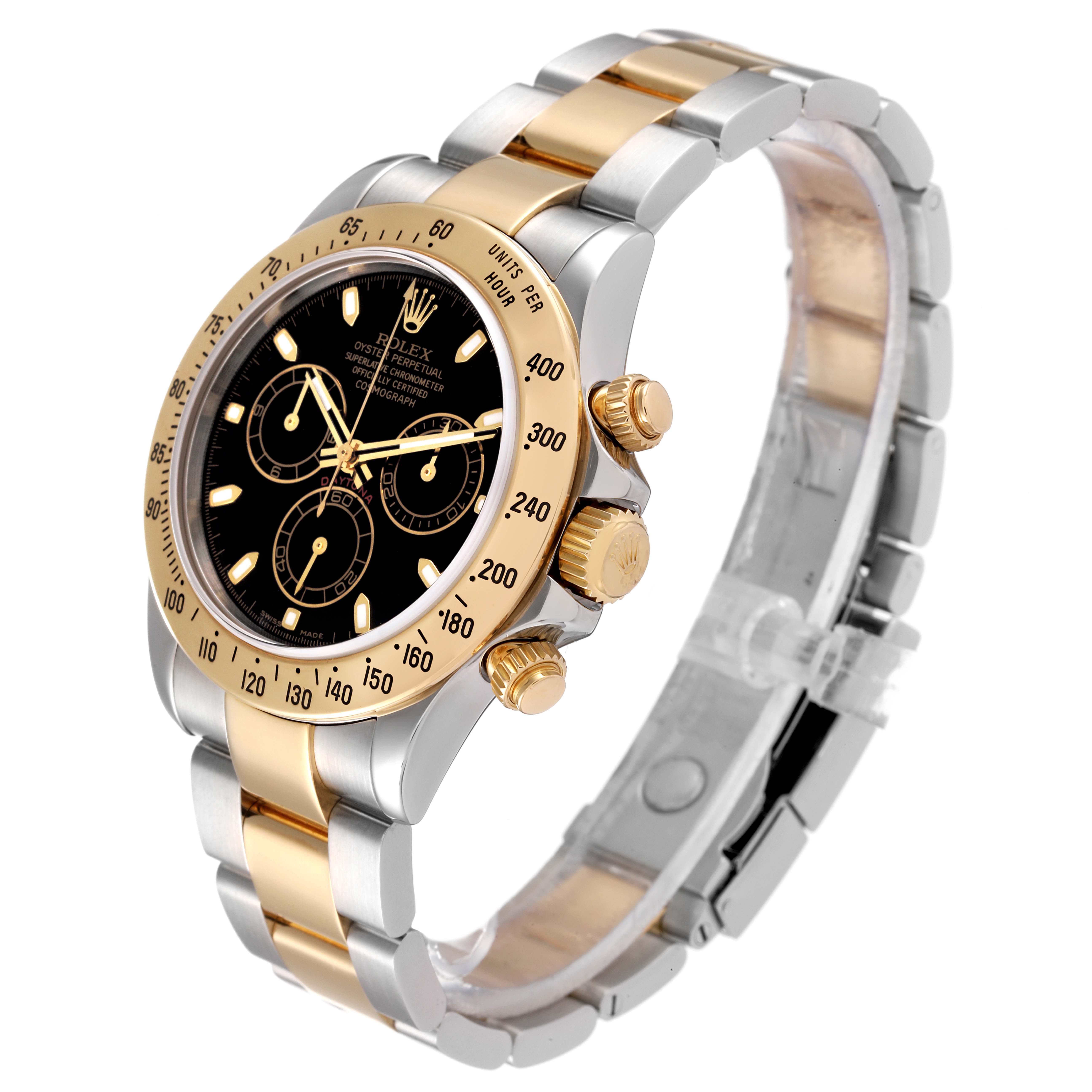 The Rolex Daytona 116523 Men's Steel and Gold (two tone) Black Dial 116523 Men's Steel and Gold (two tone) Black Dial watch is shown at an angled side view, displaying its gold bezel, black dial, and two-tone bracelet.
