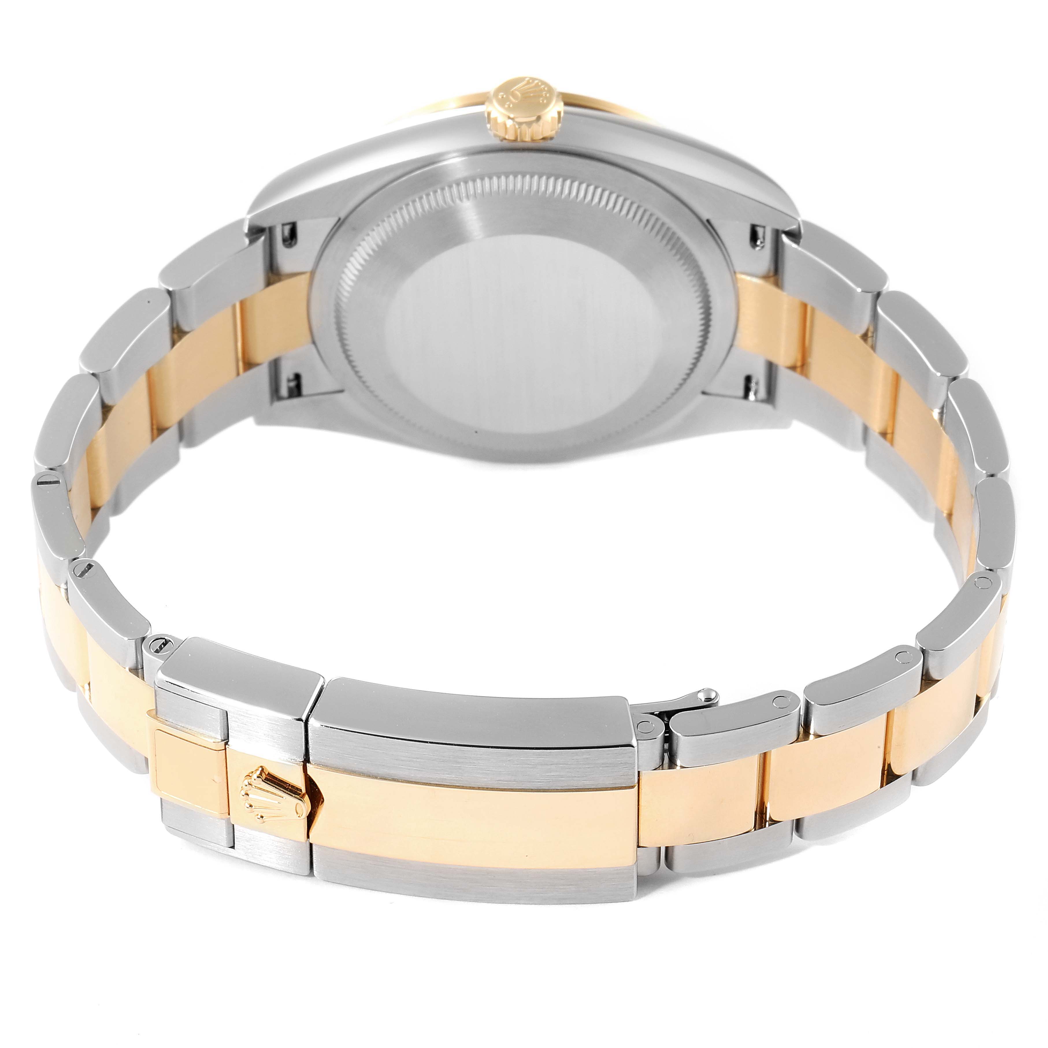 This image shows the back and bracelet of the Rolex Explorer 124273 Men's Steel and Gold (two tone) Black Dial 124273 Men's Steel and Gold (two tone) Black Dial watch, highlighting the stainless steel and gold links.