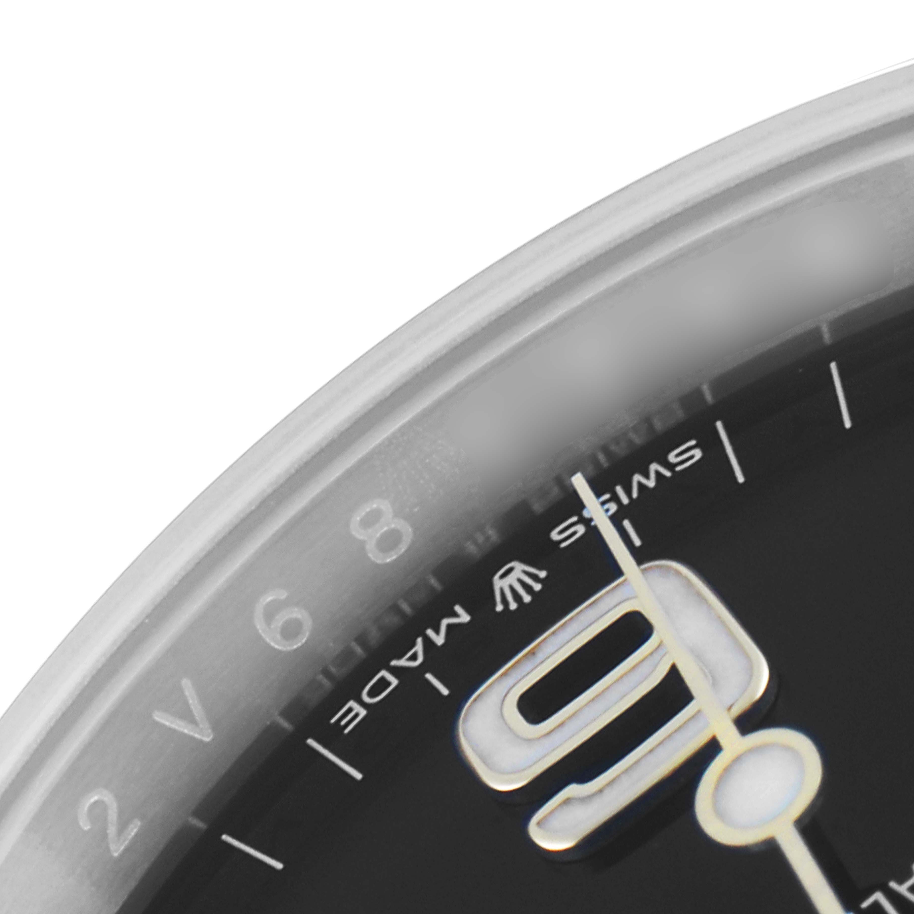 The image shows a close-up partial view of the dial and markers of a Rolex Explorer 124273 Men's Steel and Gold (two tone) Black Dial 124273 Men's Steel and Gold (two tone) Black Dial watch.
