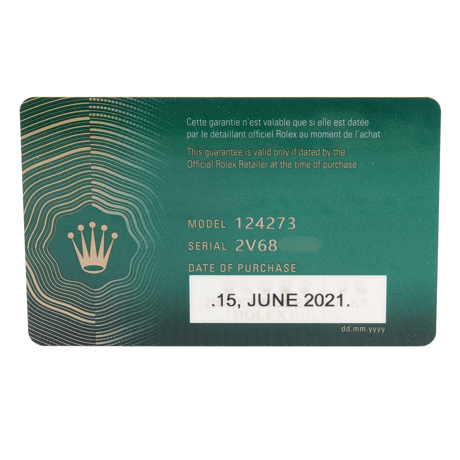 This image shows a warranty card for a Rolex Explorer 124273 Men's Steel and Gold (two tone) Black Dial 124273 Men's Steel and Gold (two tone) Black Dial model watch dated June 15, 2021.