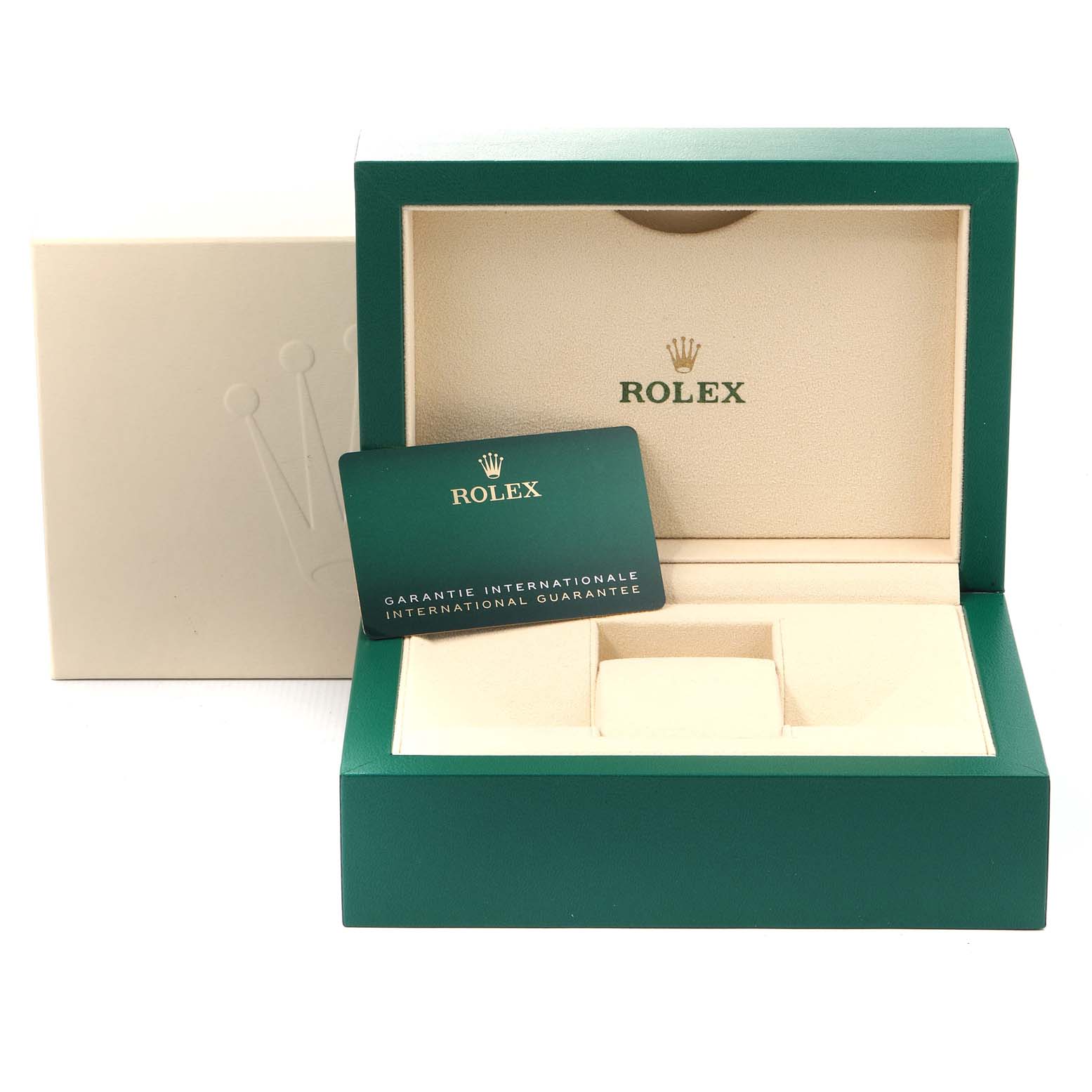 The image shows the green and cream presentation box and international guarantee card of a Rolex Mid-Size 277200 Women
s Stainless Steel Black Dial 277200 Women
s Stainless Steel Black Dial model.