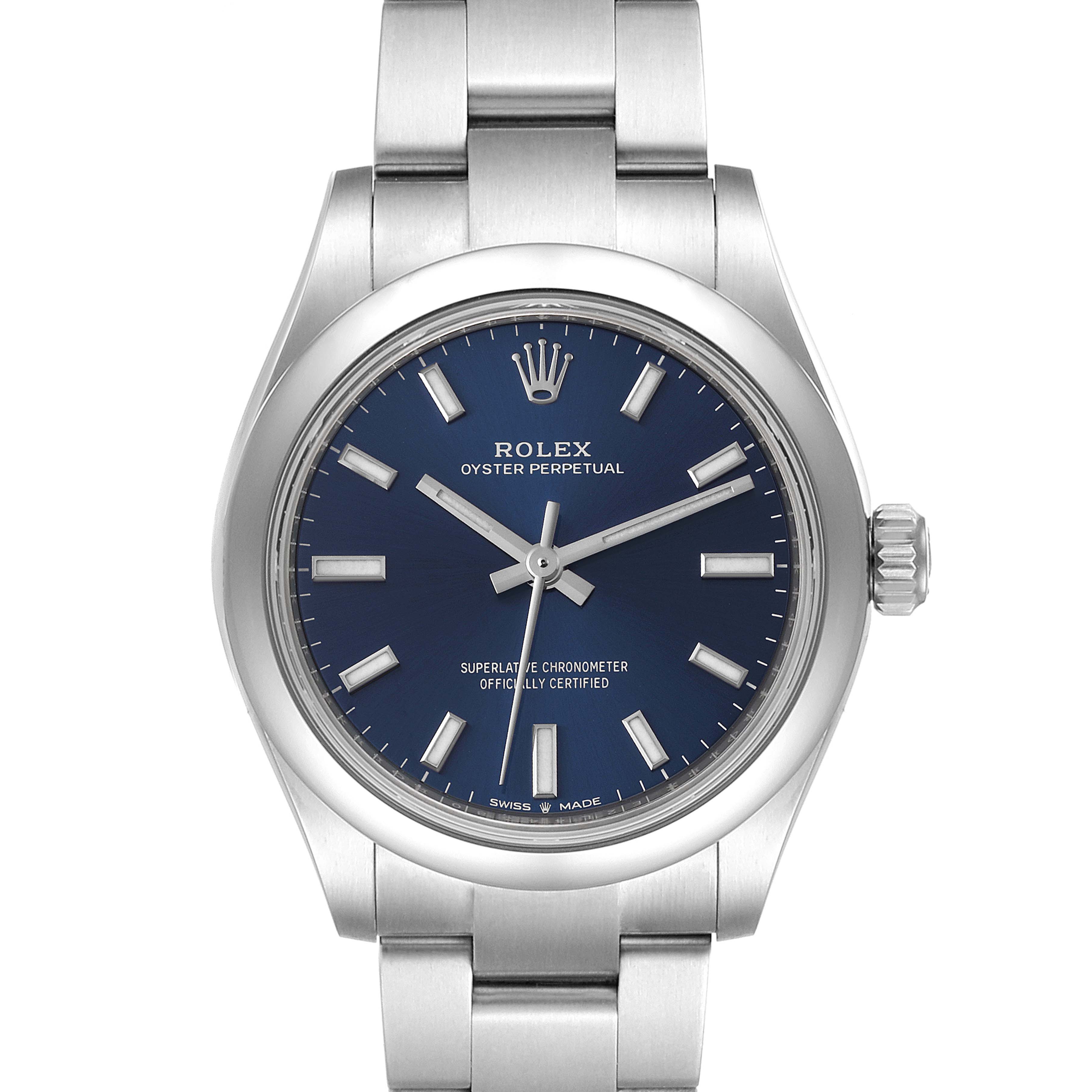 The image shows a front view of a Rolex Oyster Perpetual Mid-Size model featuring a blue dial and stainless steel bracelet.