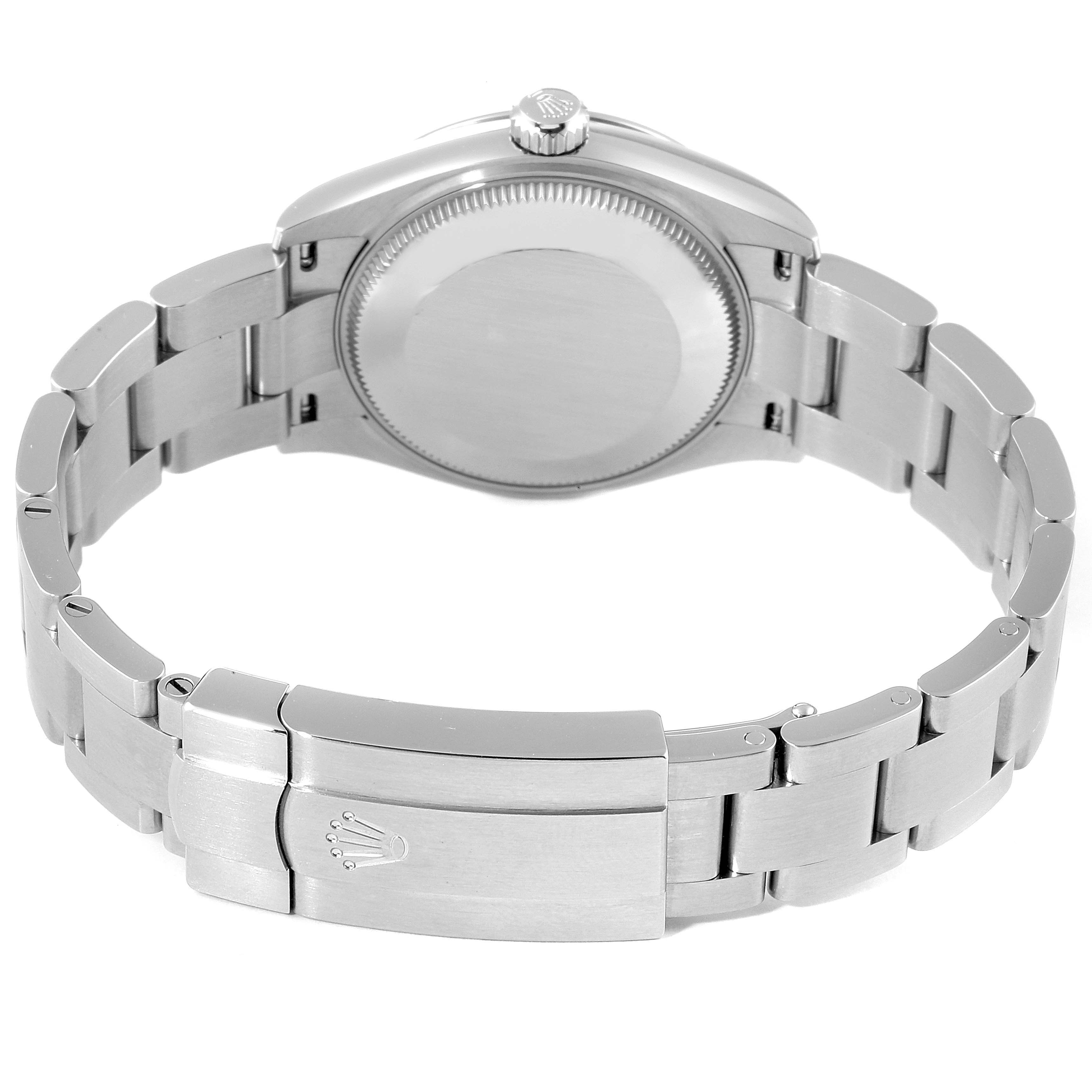 The image shows the back and clasp of a Mid-Size Rolex watch in a fully extended bracelet position.