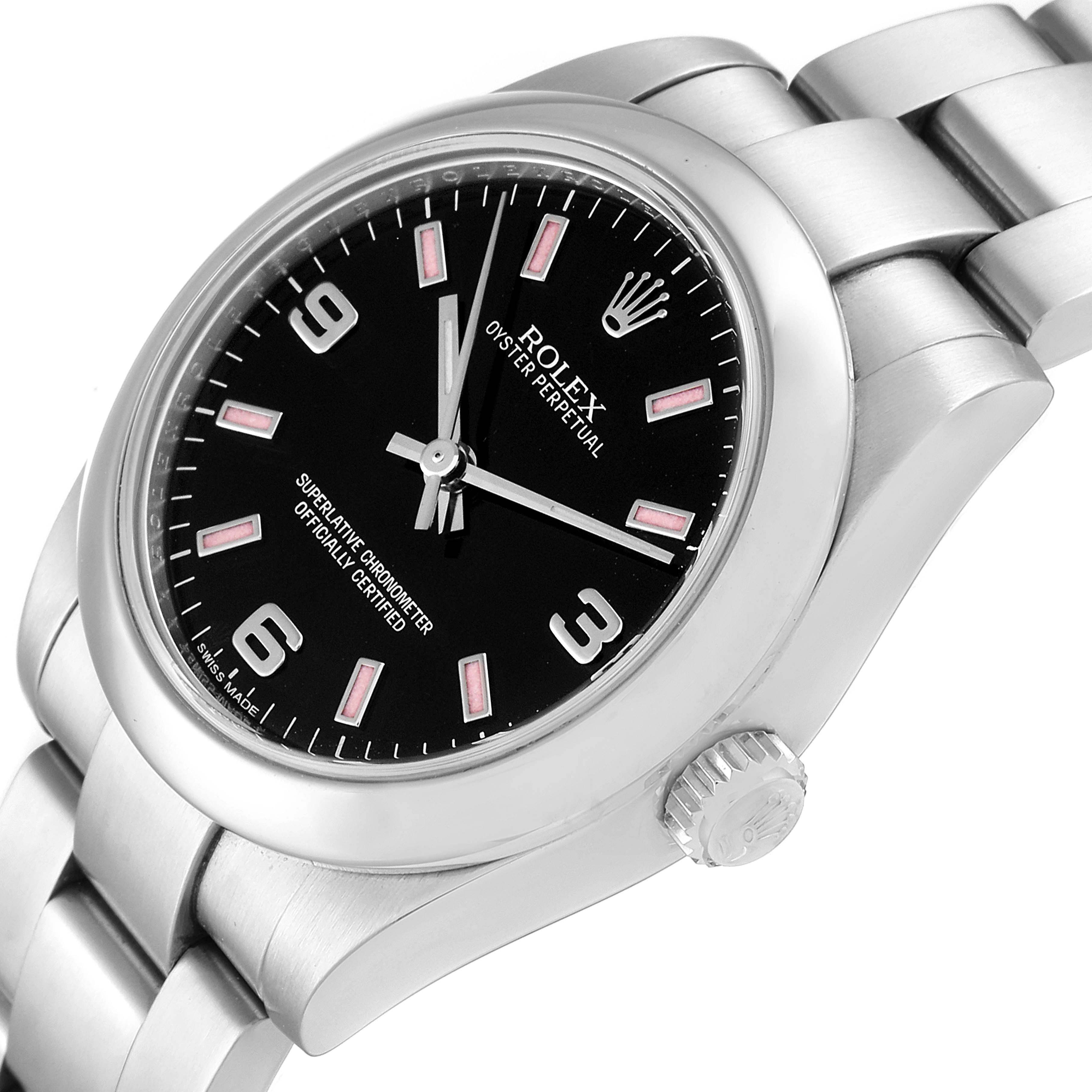 The image shows a close-up, angled view of a Rolex Oyster Perpetual Mid-Size watch, highlighting the face, bezel, and part of the bracelet.