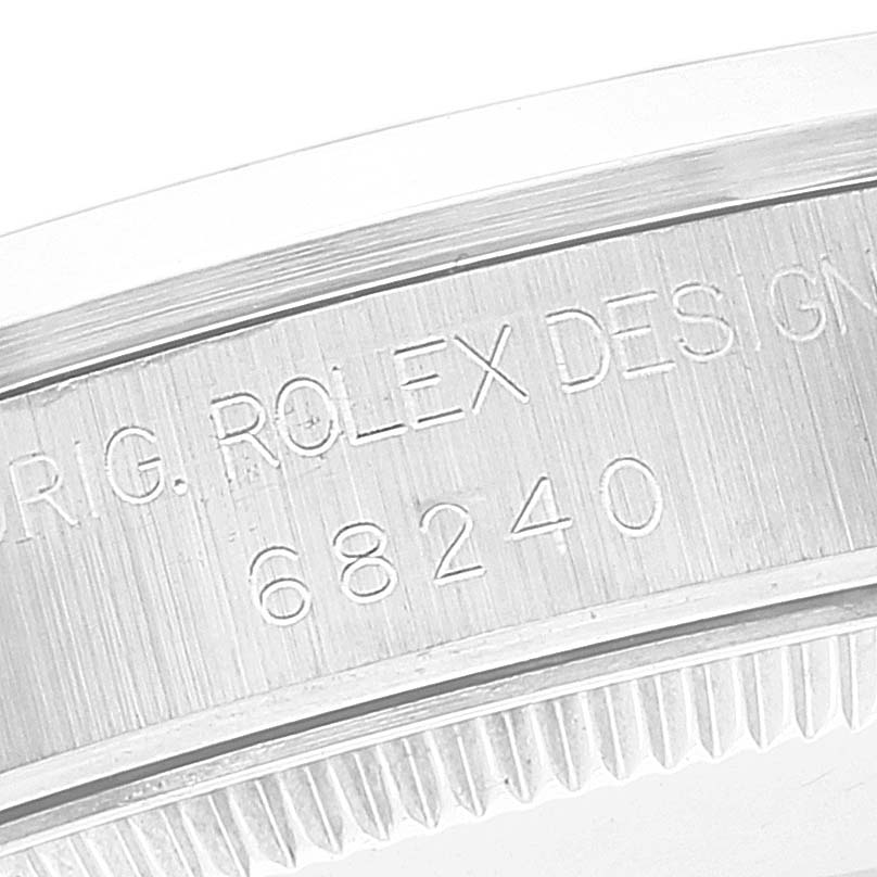 This image shows a close-up of the side of a Mid-Size Rolex watch, focusing on the engraved model number "68240."