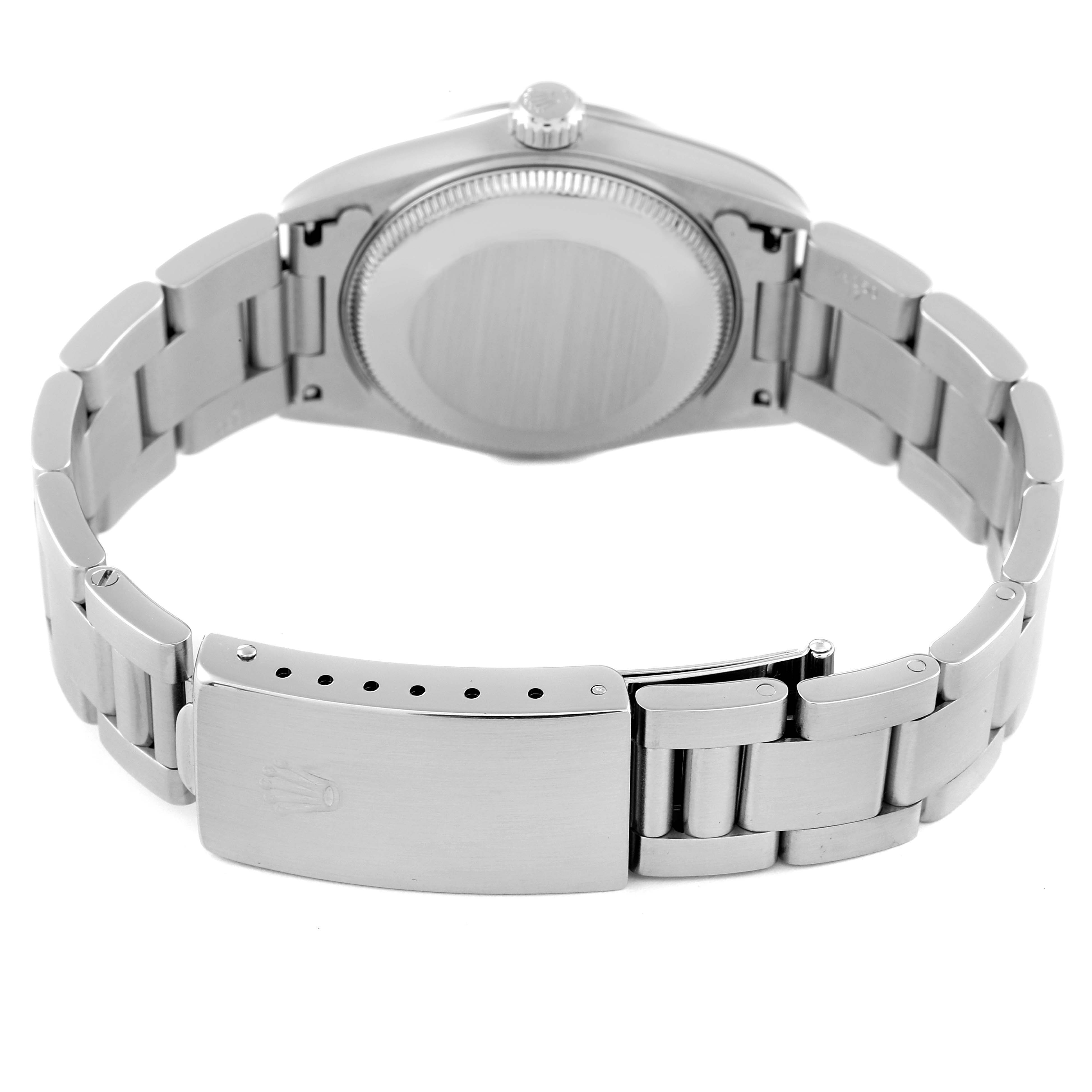 This image shows the back view of a mid-size Rolex watch, highlighting the case back and bracelet.